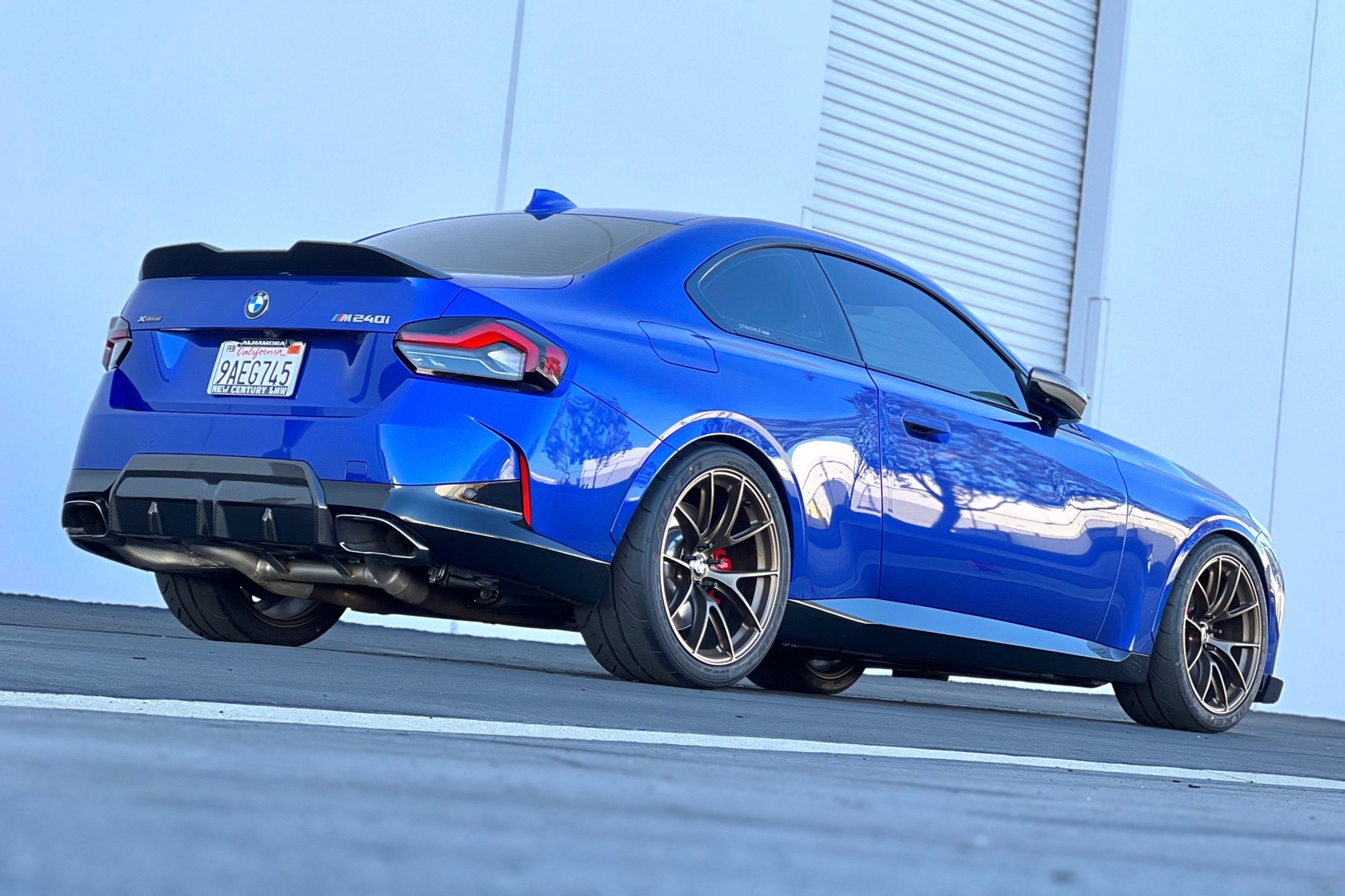 Blue BMW G42 2 Series with 19" VS-5RS Apex wheels in Satin Bronze