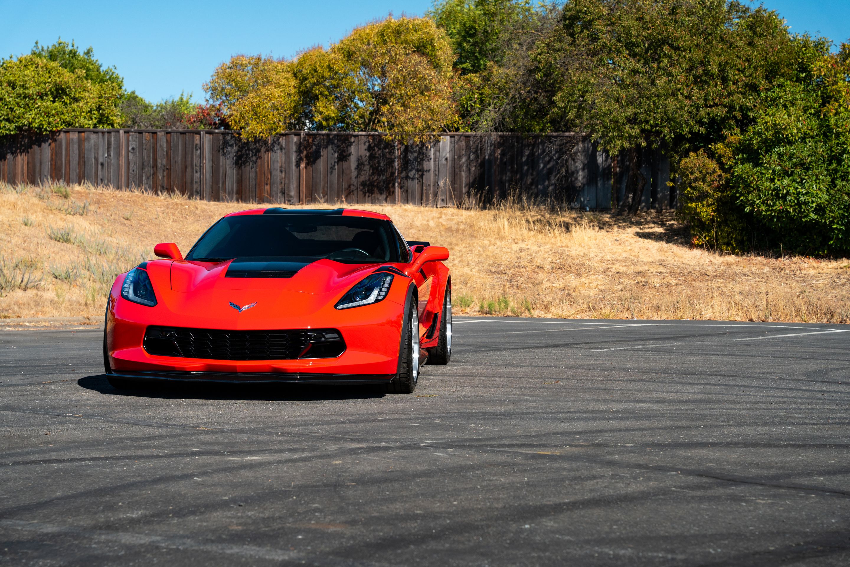 Red Chevrolet C7 Corvette Grand Sport with 18"/19" ML-10RT Apex wheels in Machined Lip Race Silver