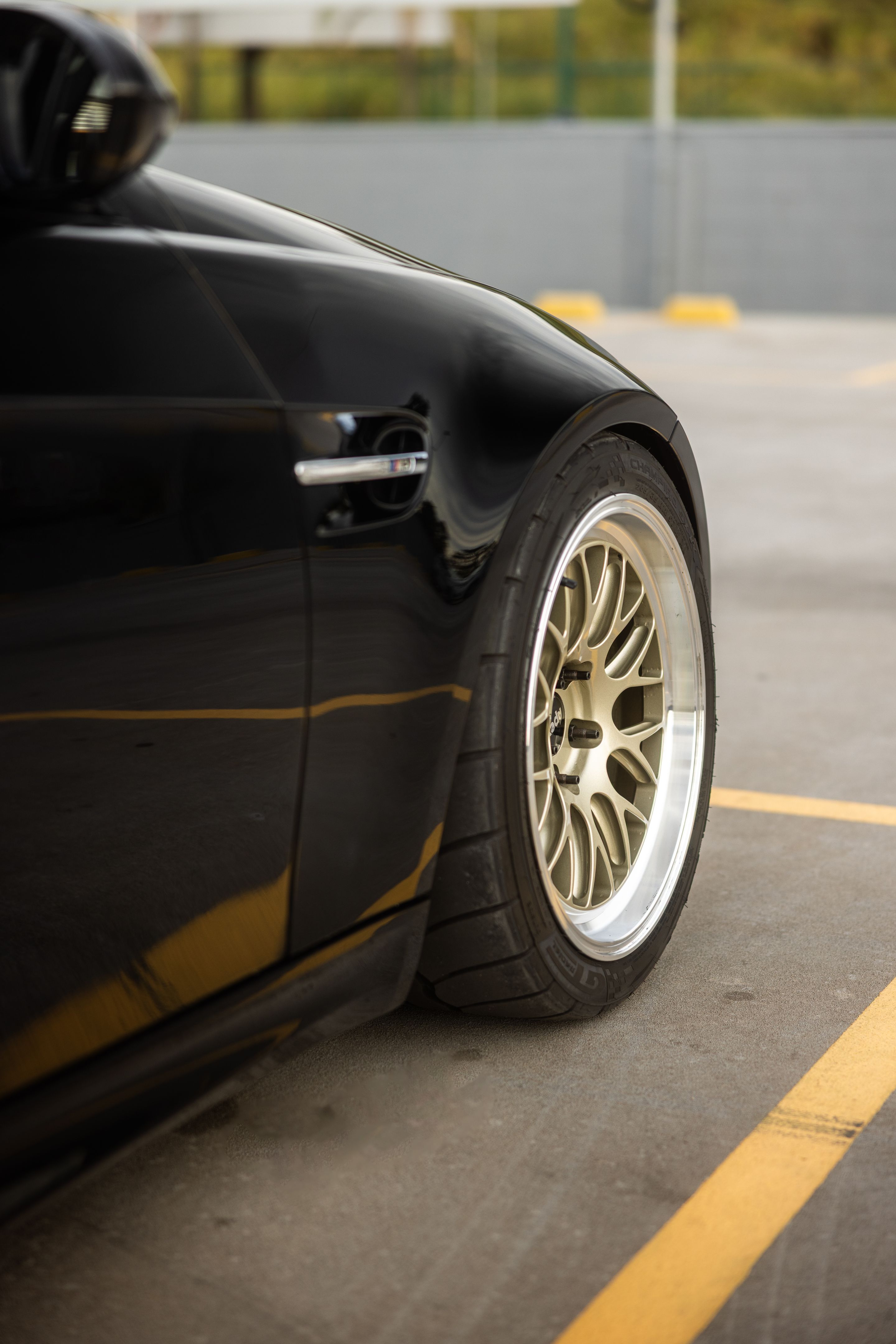 Black BMW E92 Coupe M3 with 18" ML-10RT Apex wheels in Machined Lip Gloss Motorsport Gold