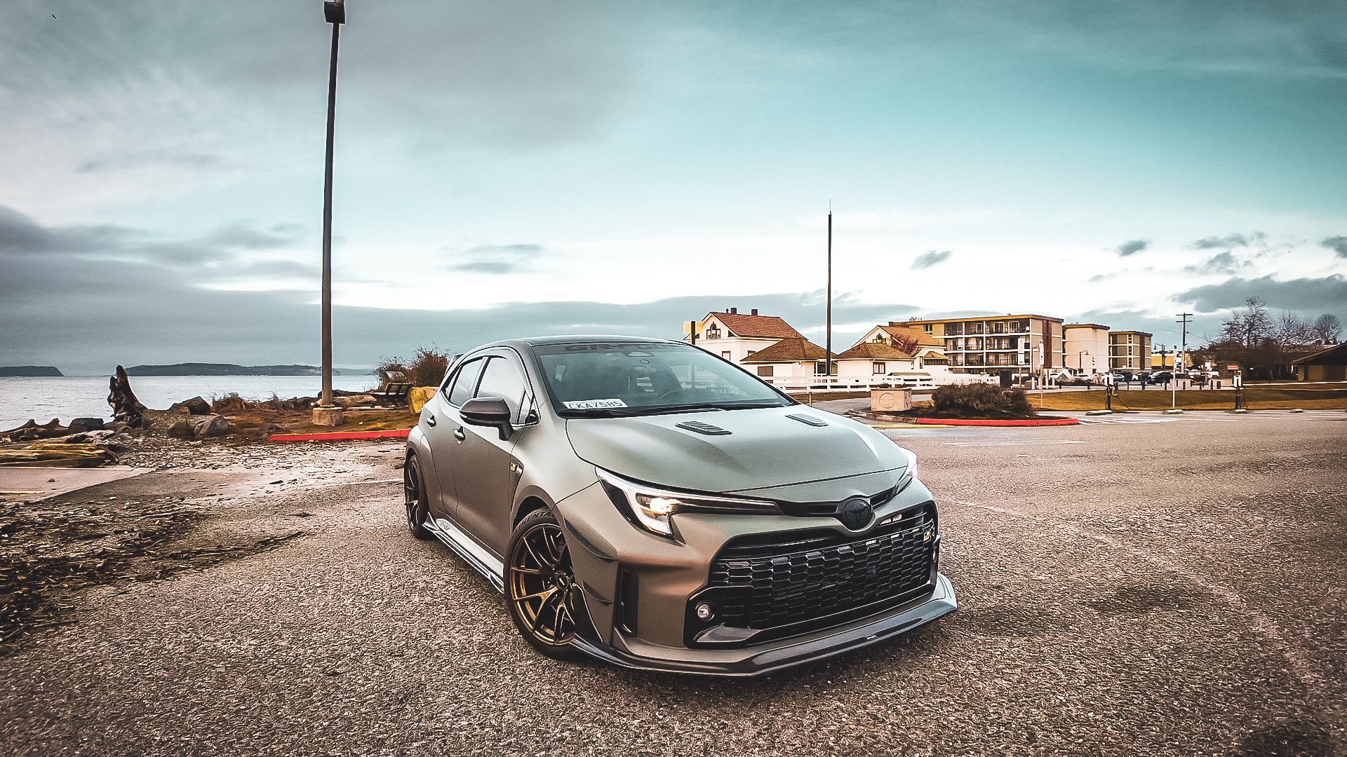 Green Toyota GR Corolla with 18" VS-5RS Apex wheels in Satin Bronze