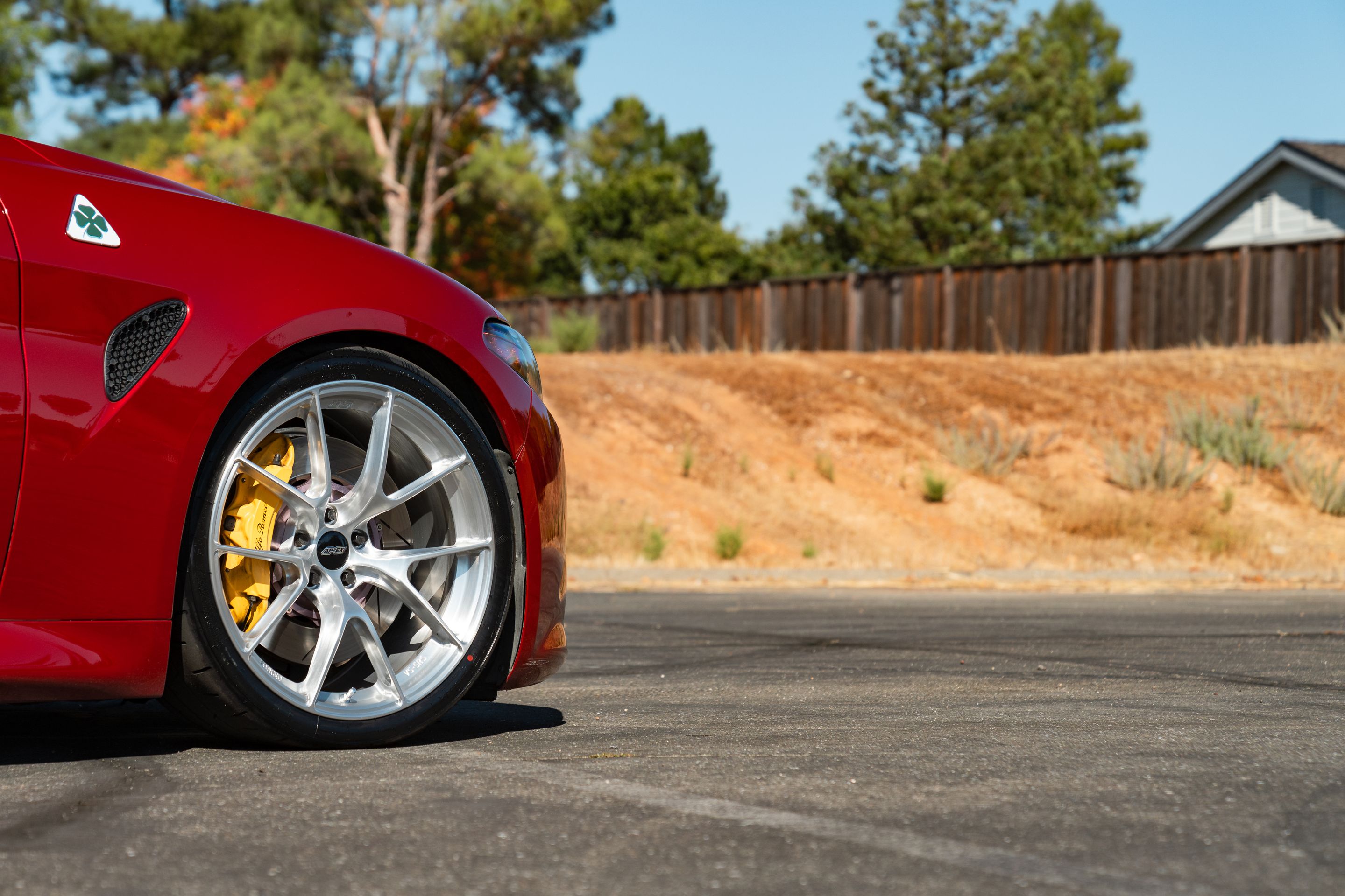 Red Alfa Romeo Giulia Quadrifoglio with 19" VS-5RS Apex wheels in Brushed Clear