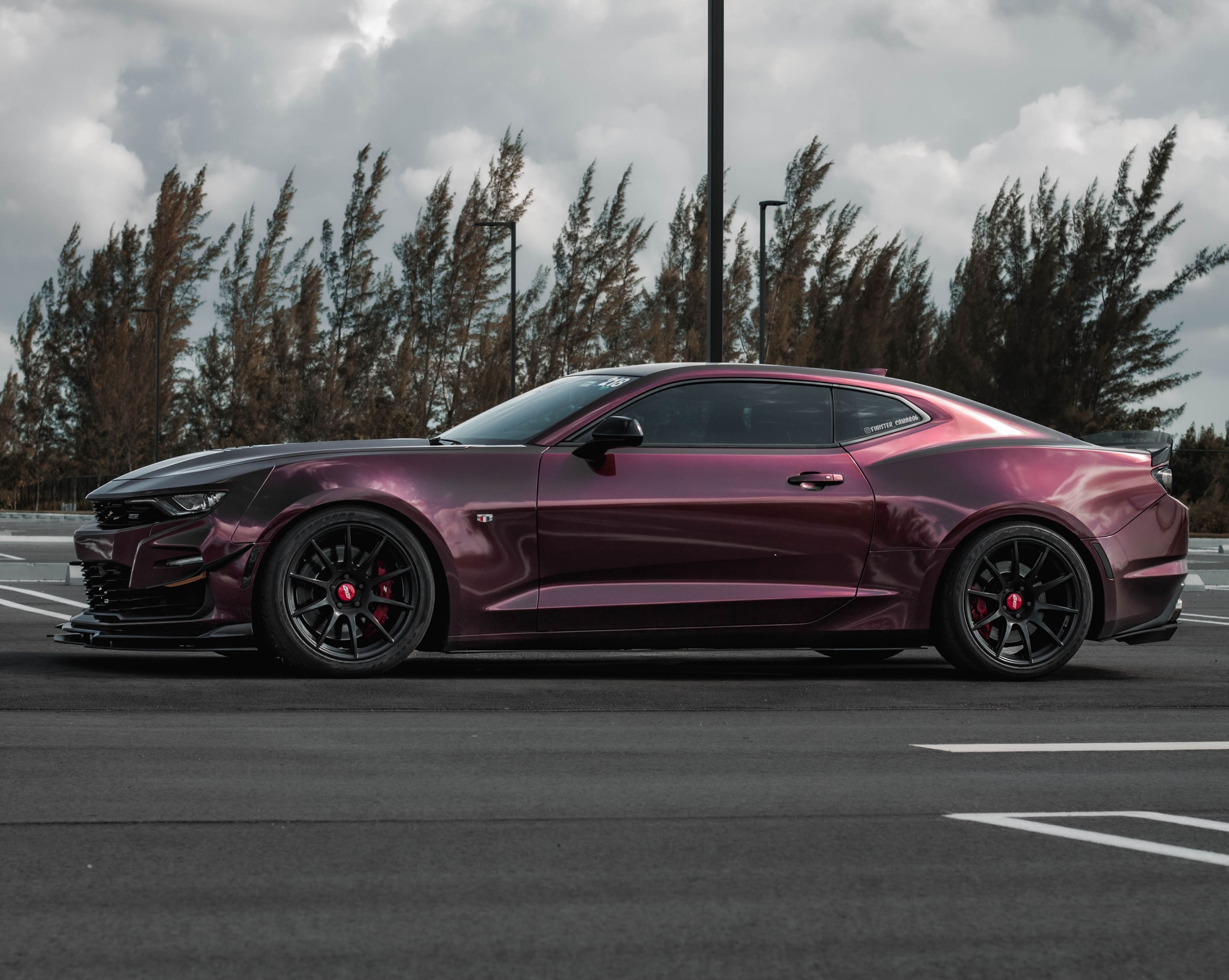 Red Chevrolet 6th Gen Camaro SS with 19" SM-10 Apex wheels in Satin Black