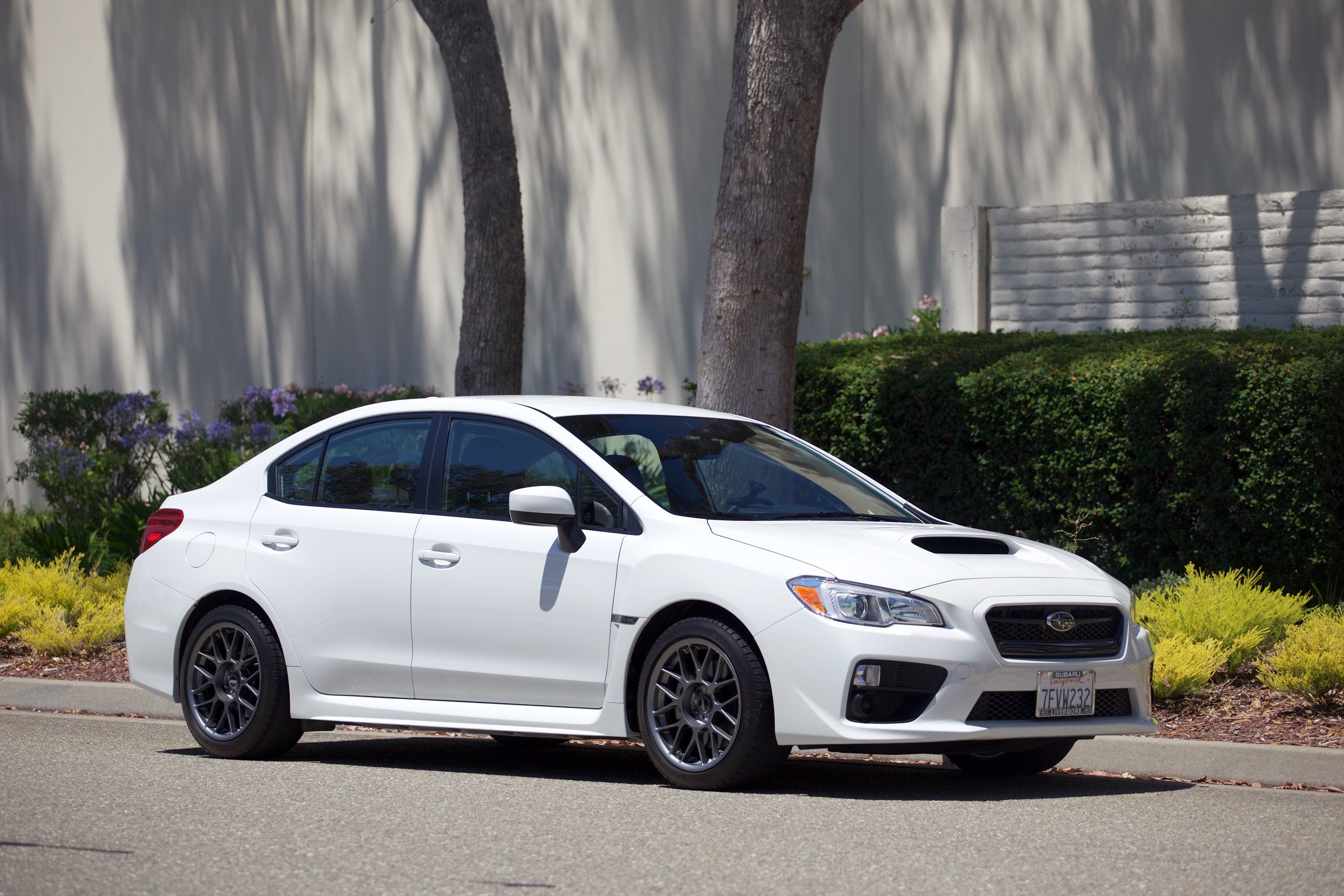 White Subaru VA WRX with 17" ARC-8 Apex wheels in Anthracite