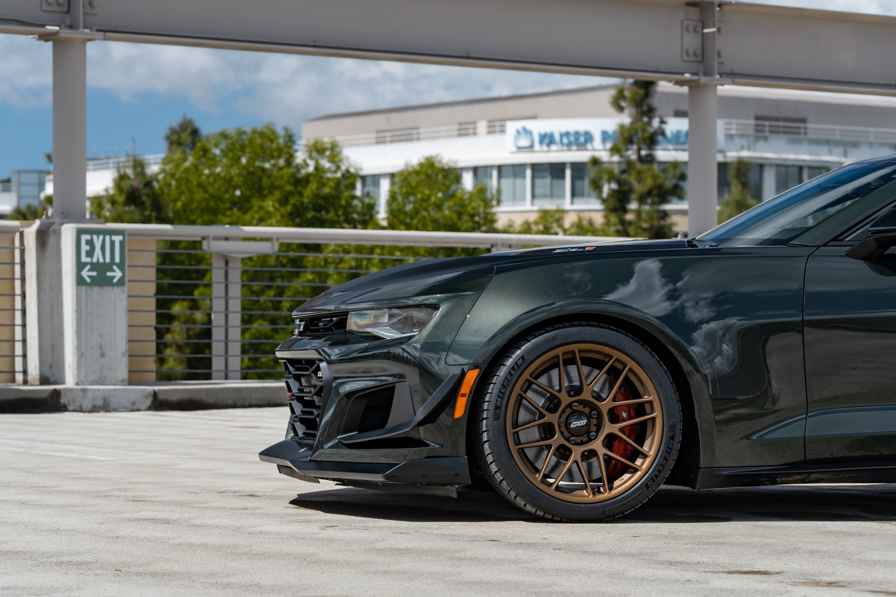 Green Chevrolet 6th Gen Camaro ZL1 1LE with 19" ARC-8 Apex wheels in Satin Bronze