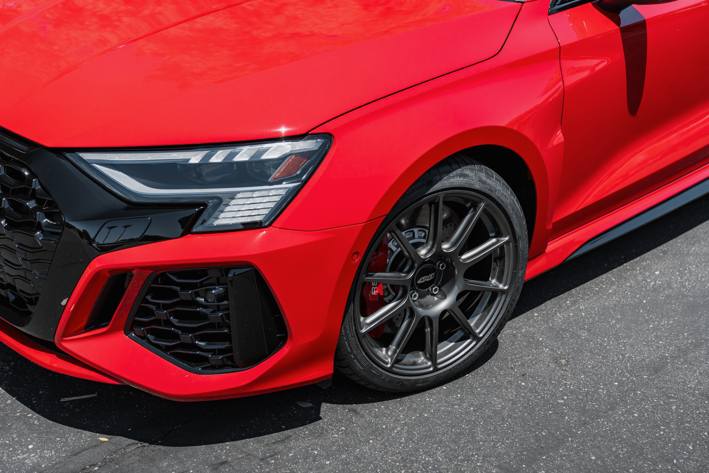 Red Audi 8Y RS 3 with 18" SM-10 Apex wheels in Anthracite