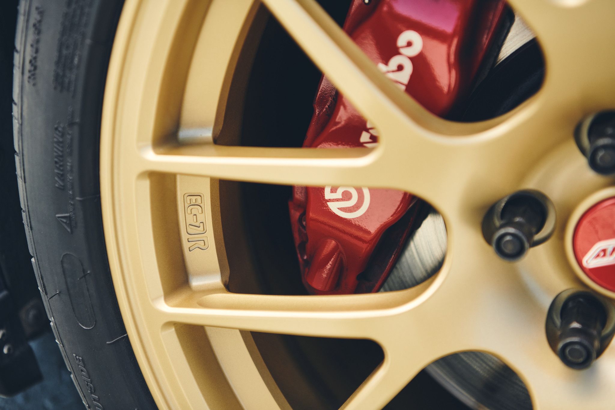 Blue Subaru ZC6 / Gen 1 BRZ with 17" EC-7R Apex wheels in Satin Gold