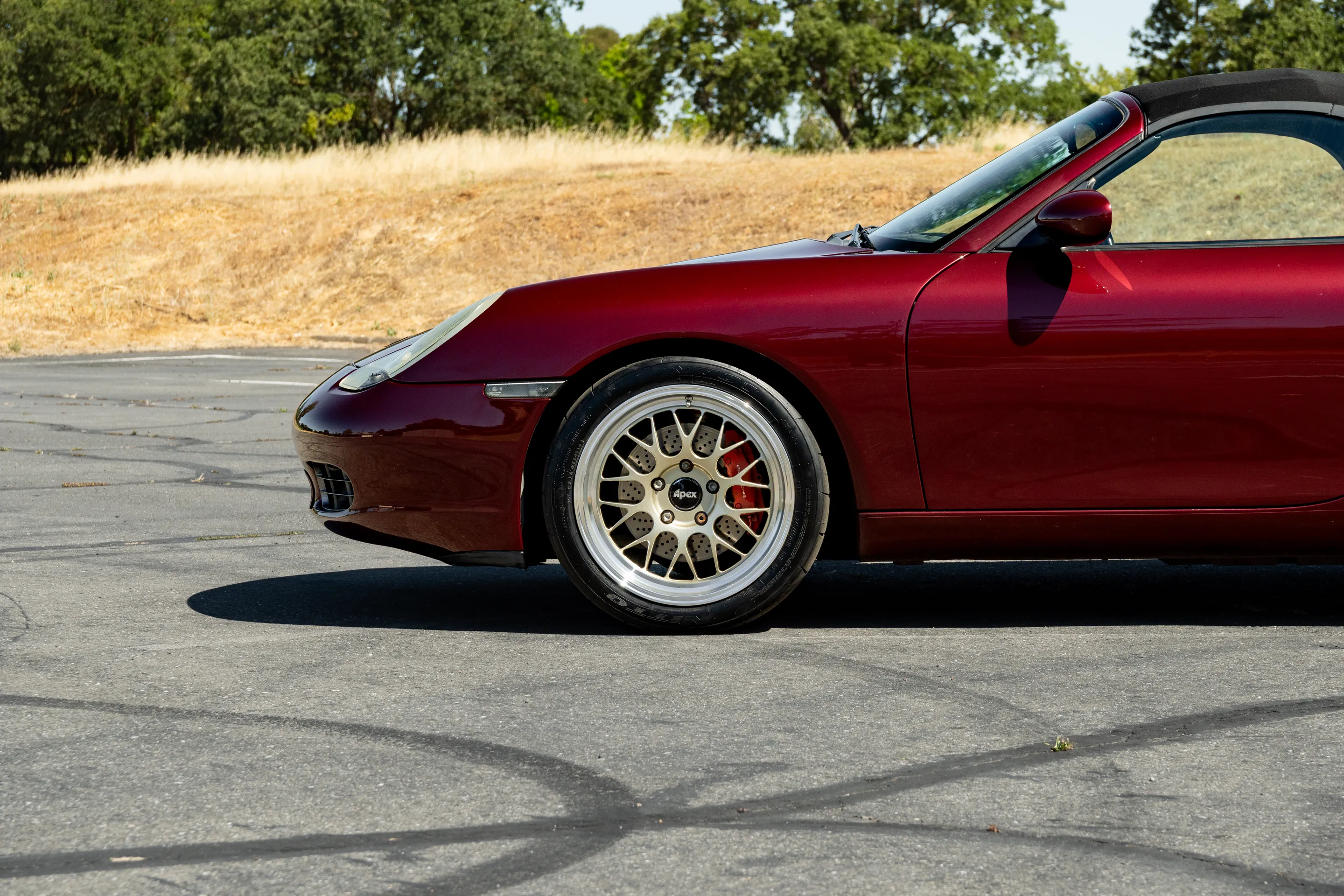 Red Porsche 986 Boxster with 18" ML-10RT Apex wheels in Machined Lip Gloss Motorsport Gold