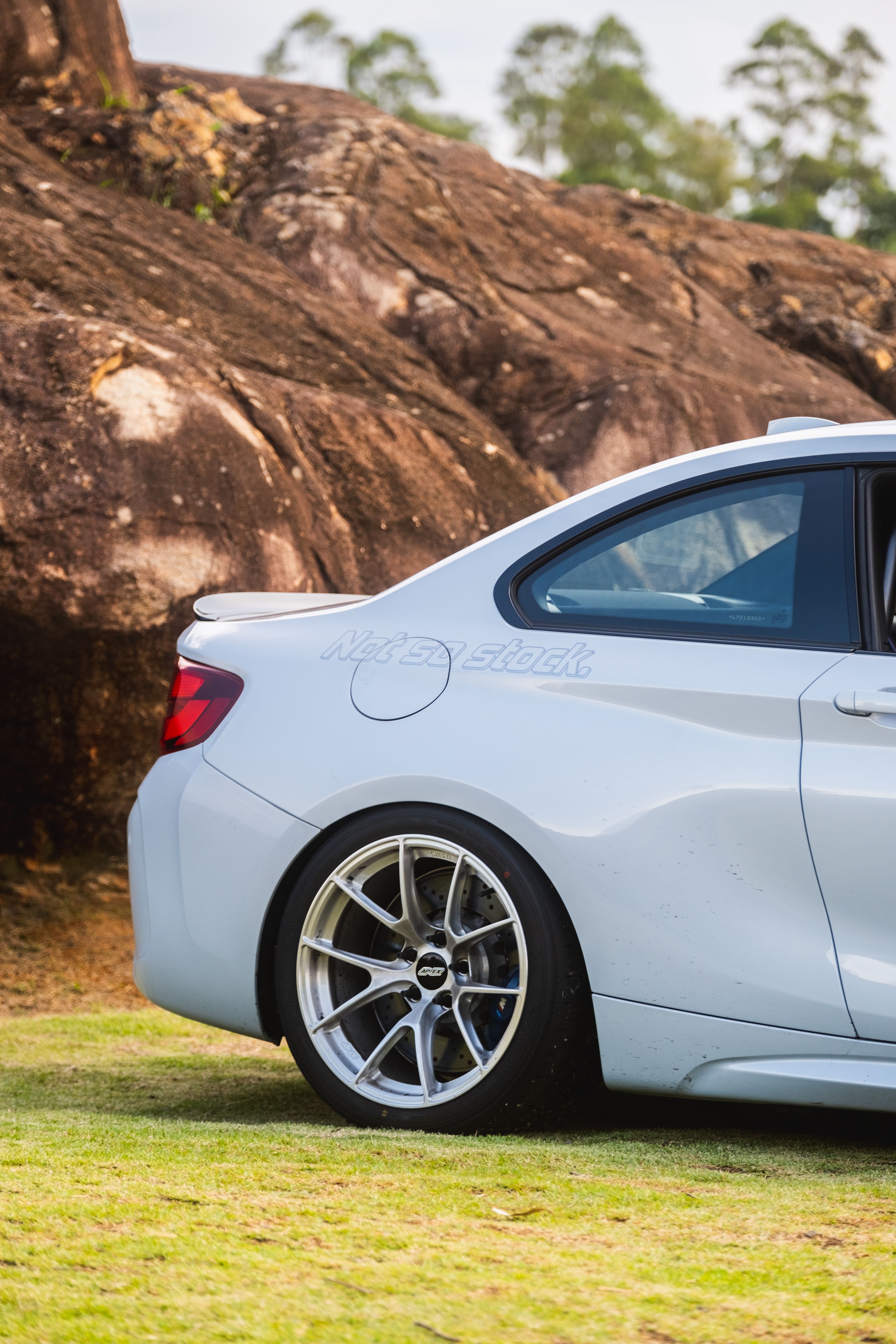 Silver BMW F87 M2 with 18" VS-5RS Apex wheels in Brushed Clear