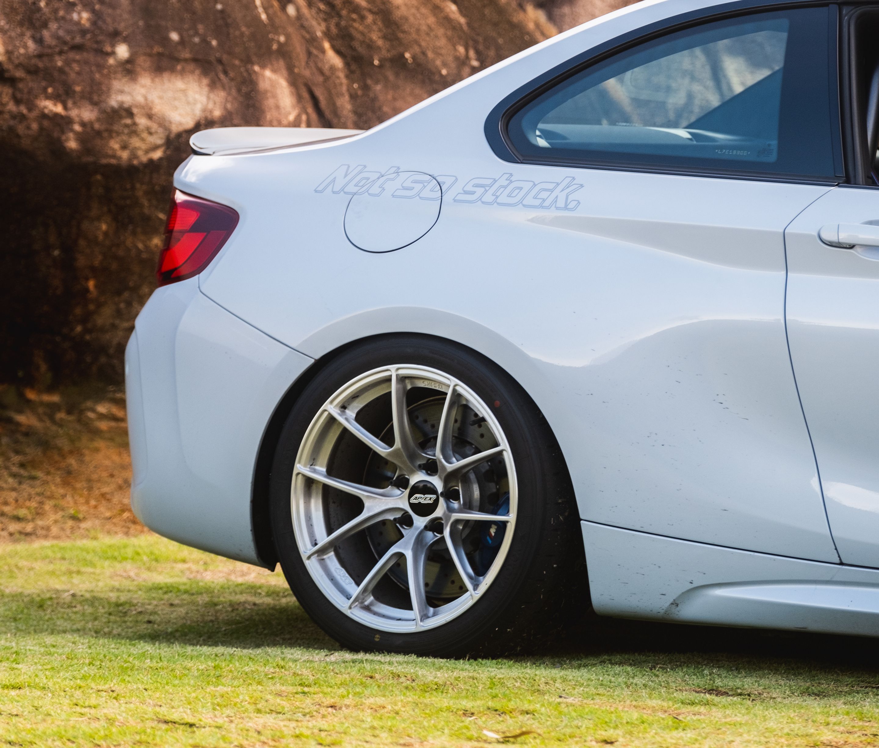 Silver BMW F87 M2 with 18" VS-5RS Apex wheels in Brushed Clear