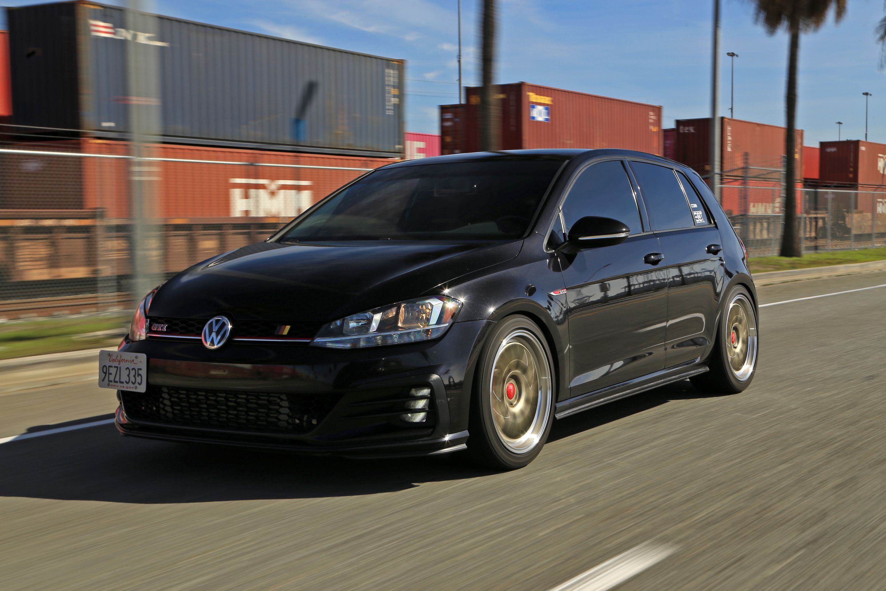 Black VW MK7 GTI with 18" ML-10RT Apex wheels in Machined Lip Gloss Motorsport Gold