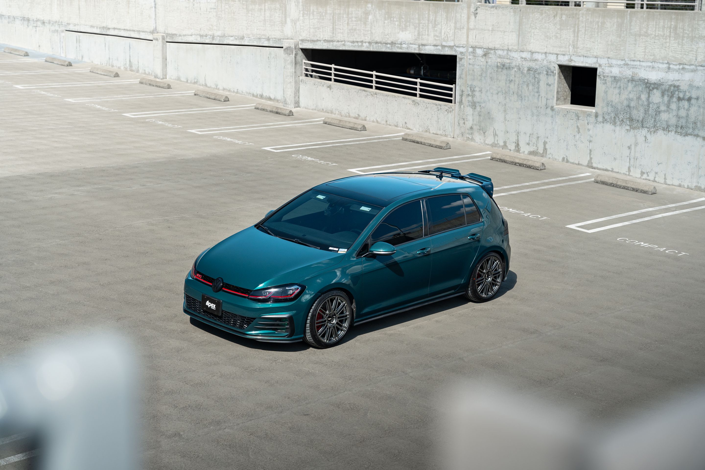 Green VW MK7 GTI with 18" TC-10RT Apex wheels in Anthracite