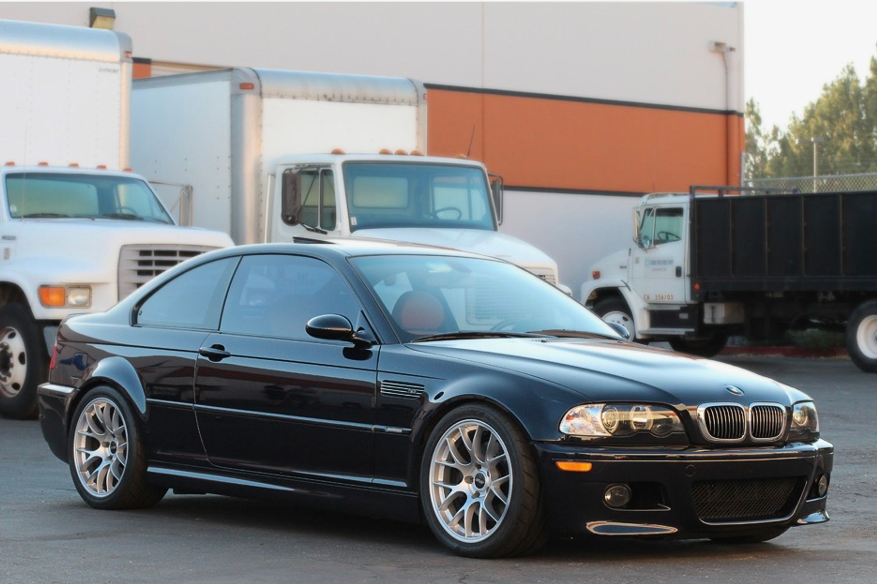 Black BMW E46 M3 with 18" EC-7 Apex wheels in Race Silver