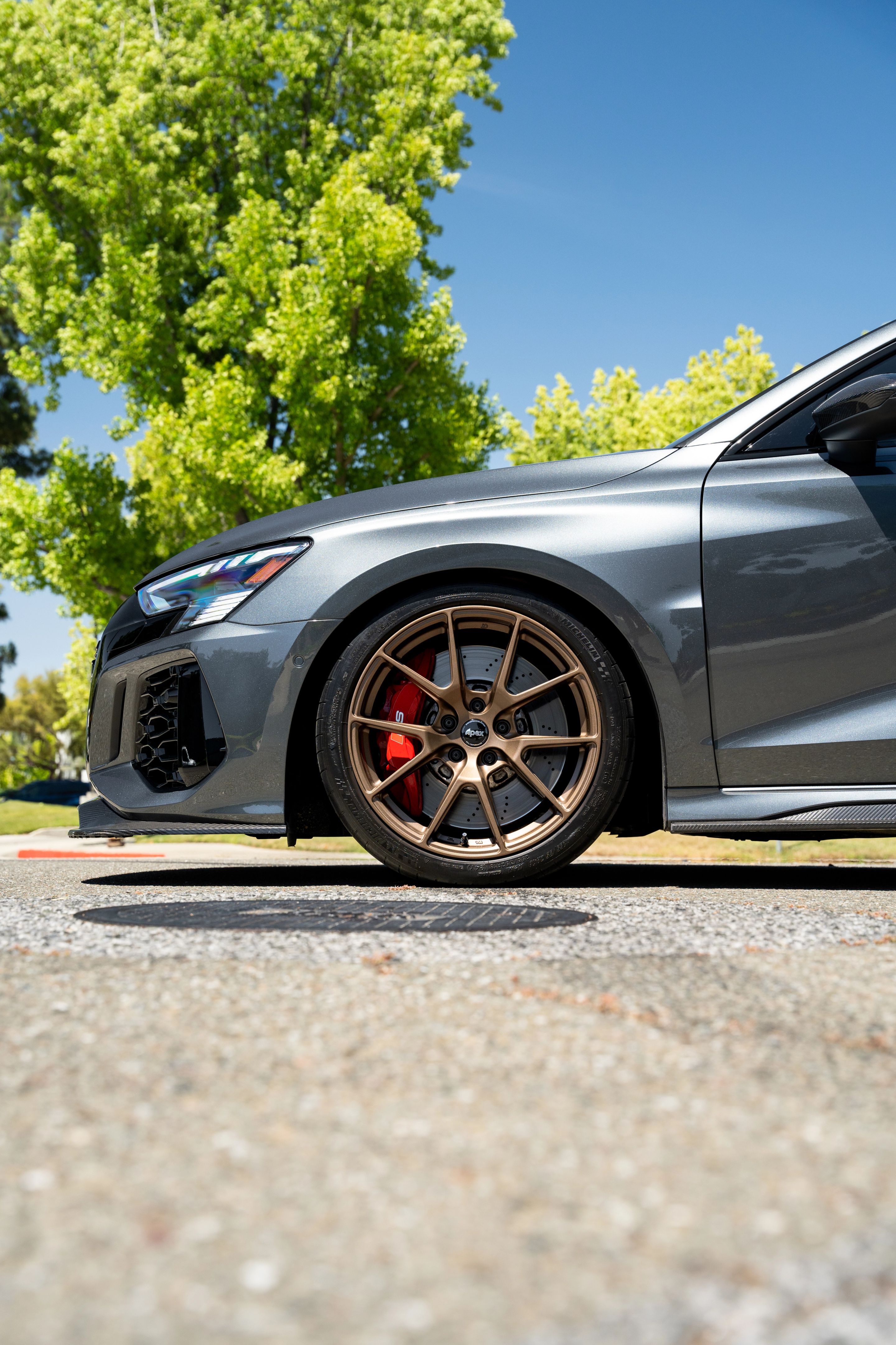 Grey Audi 8Y RS 3 with 18" VS-5 Apex wheels in Satin Bronze