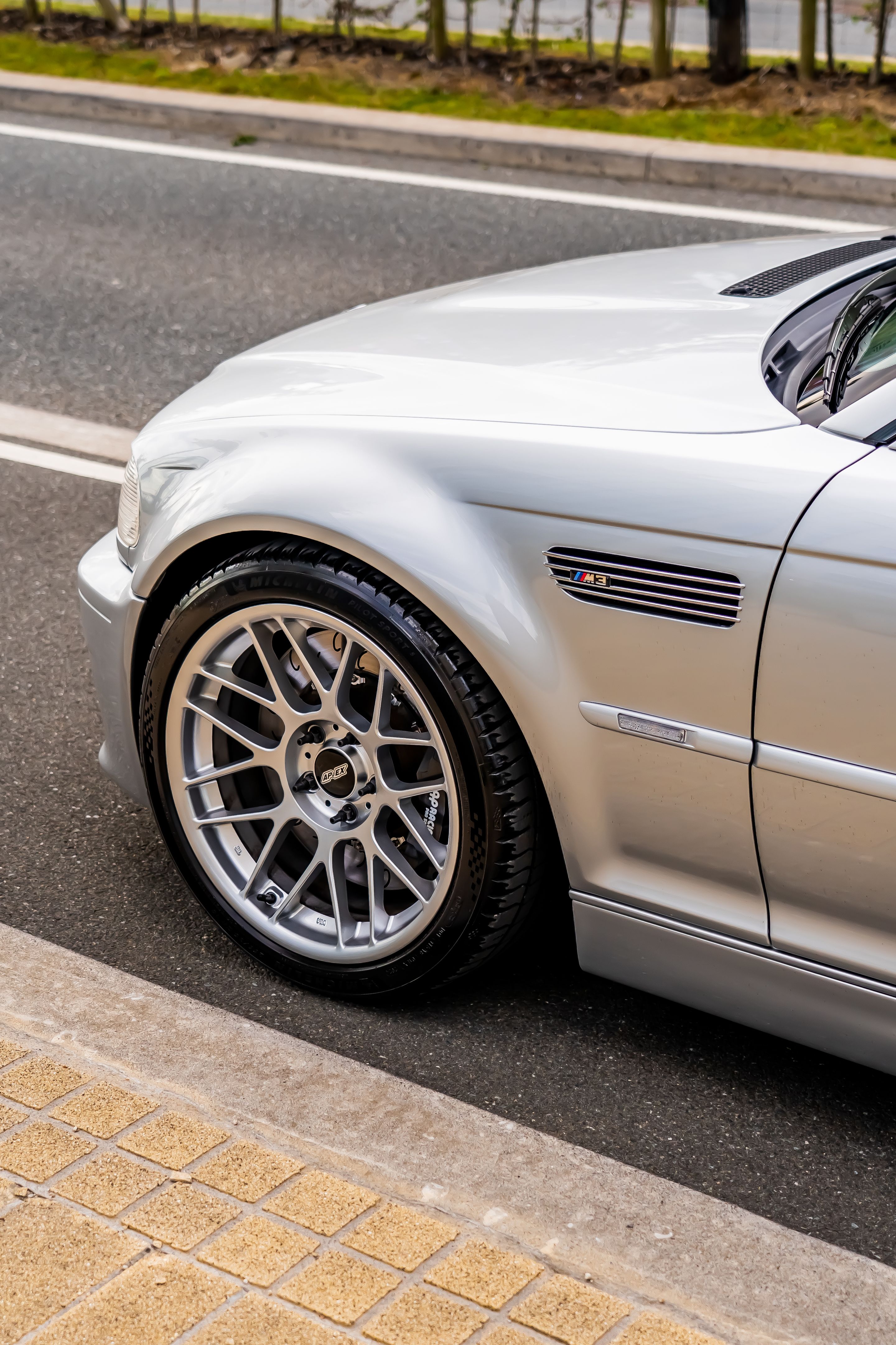 Silver BMW E46 M3 with 18" ARC-8 Apex wheels in Race Silver