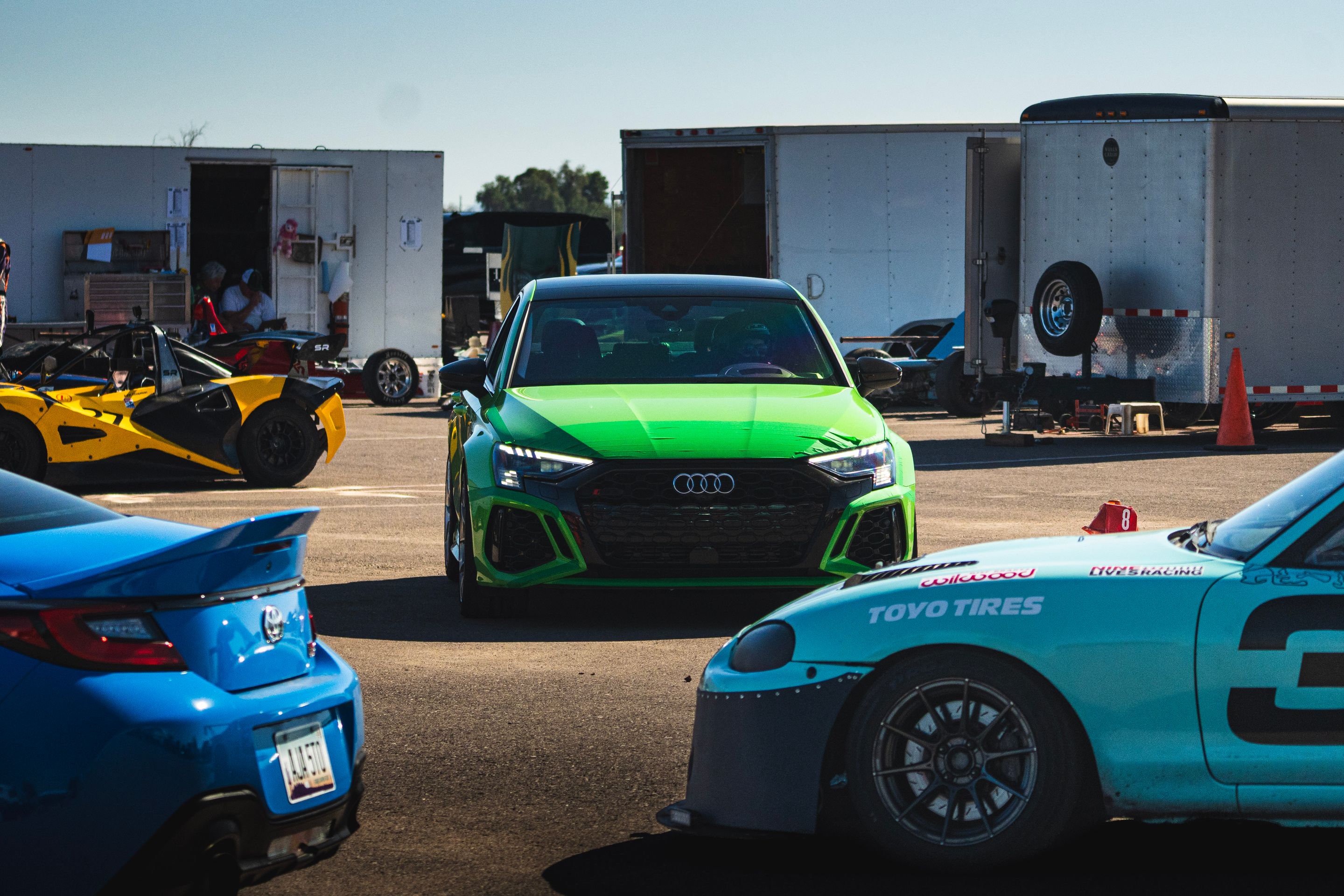 Green Audi 8Y RS 3 with 18" VS-5RS Apex wheels in Brushed Clear