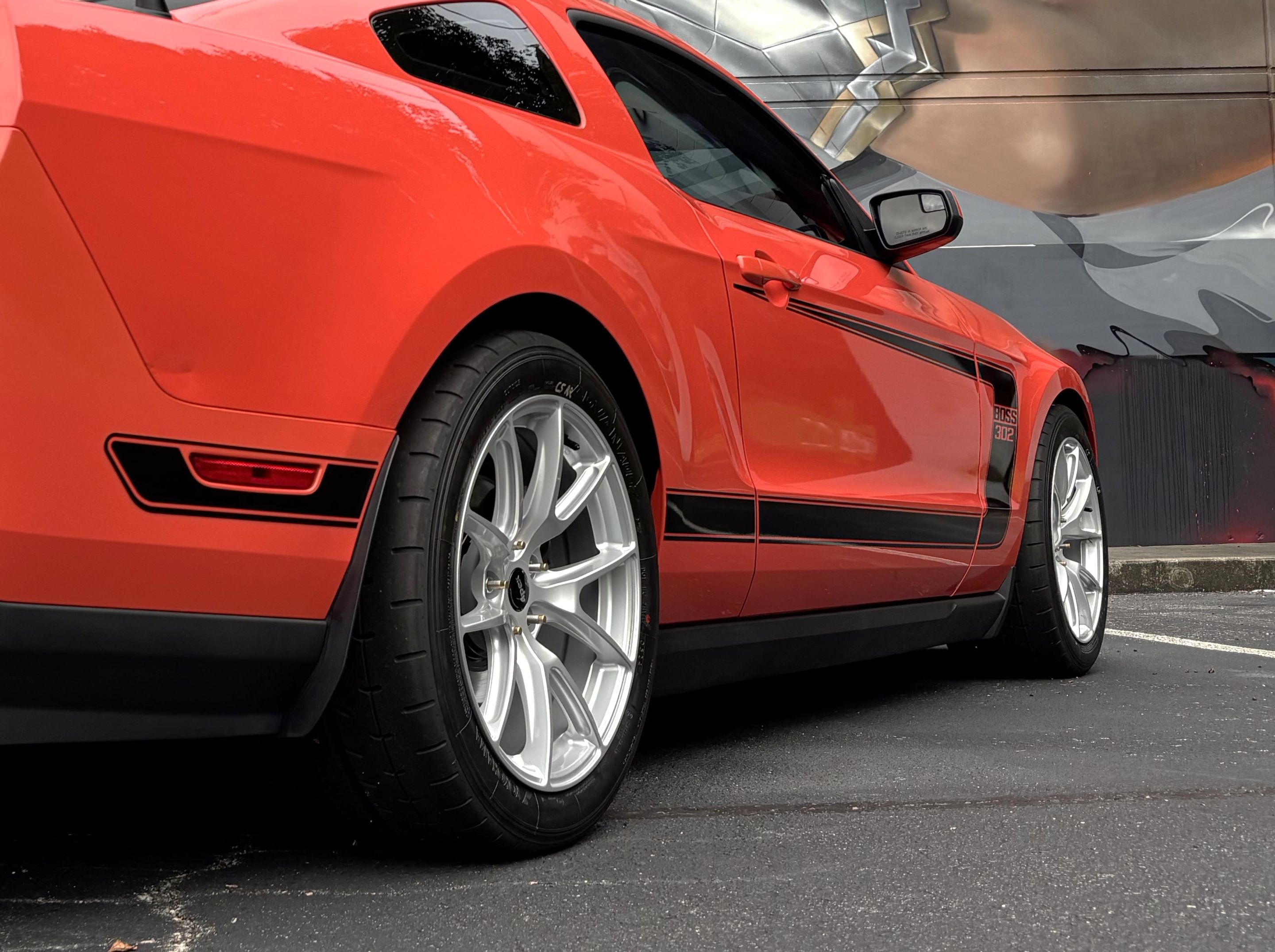 Red Ford S197 Mustang Boss 302 with 18" VS-5 Apex wheels in Race Silver