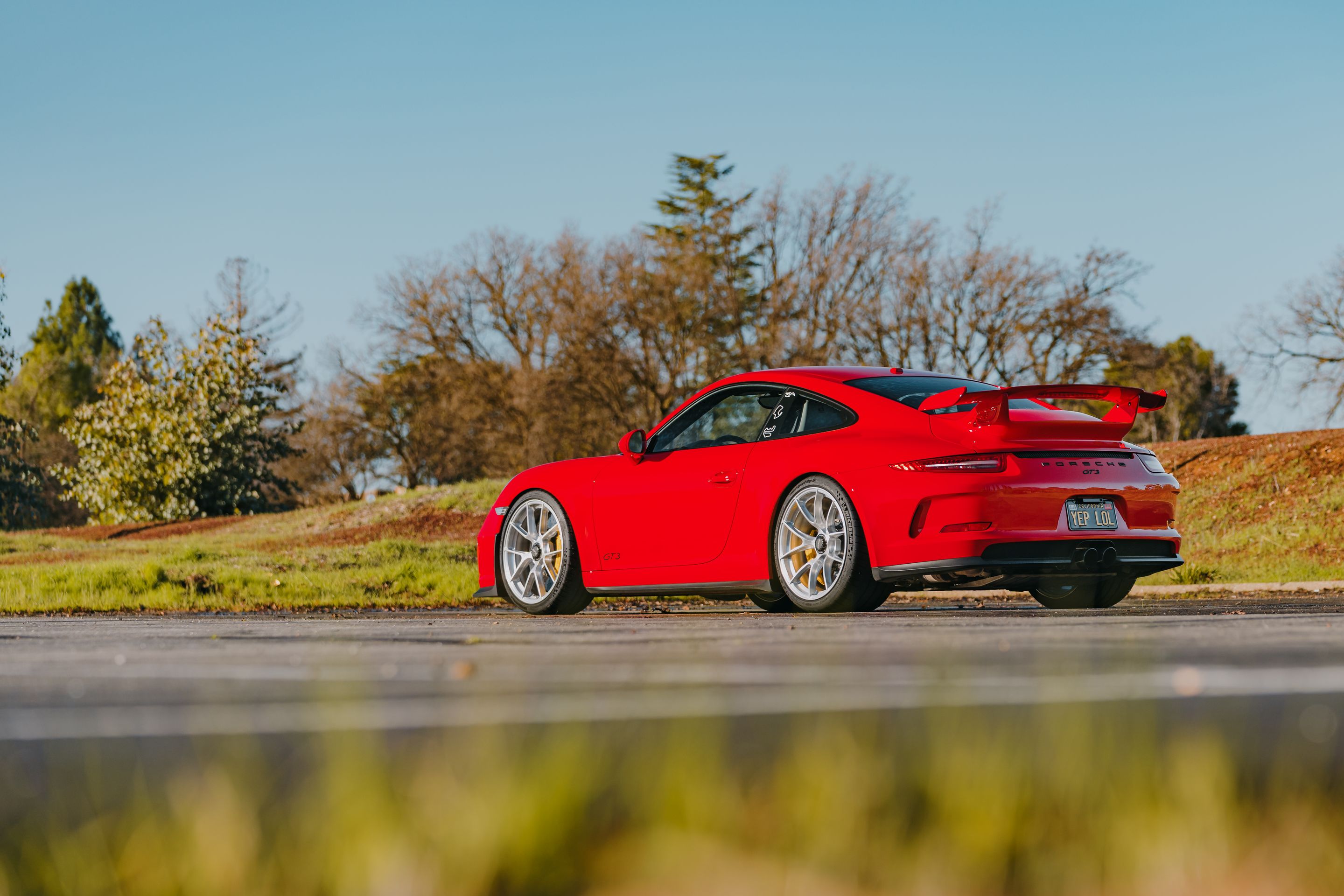Red Porsche 911 991.1 GT3 with 20" VS-5RS Apex wheels in Brushed Clear