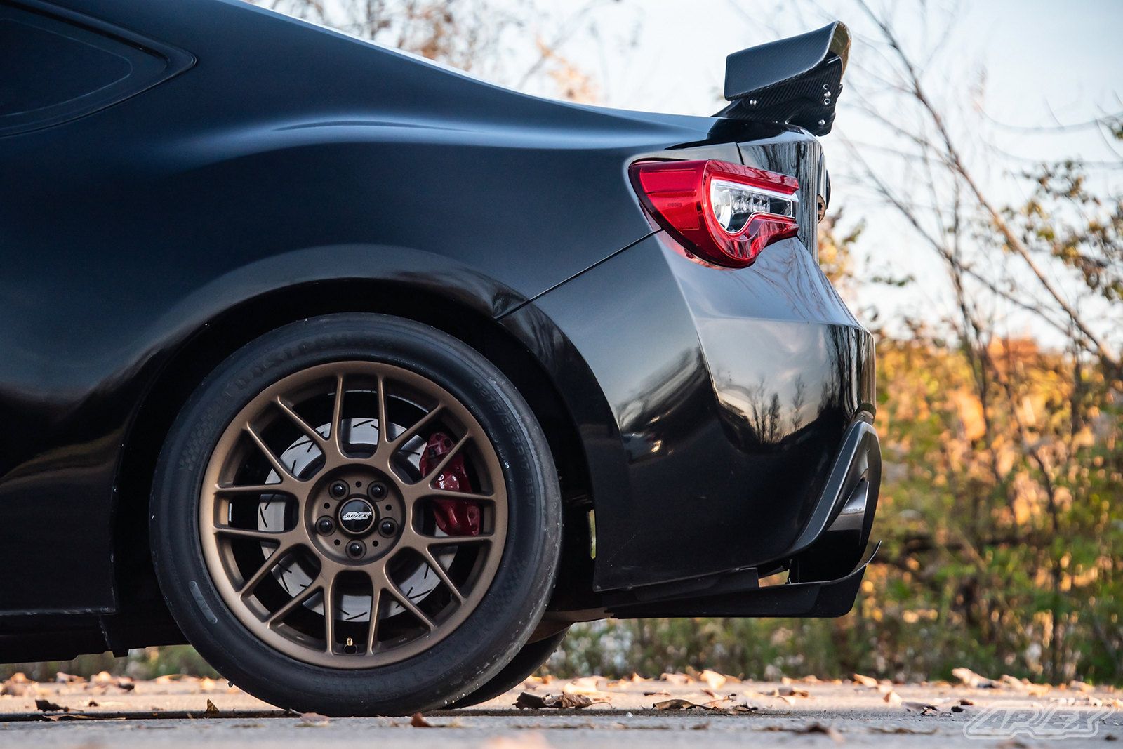 Black Scion FR-S with 17" ARC-8 Apex wheels in Satin Bronze