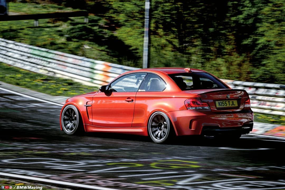 Orange BMW E82 1M with 18" SM-10 Apex wheels in Anthracite