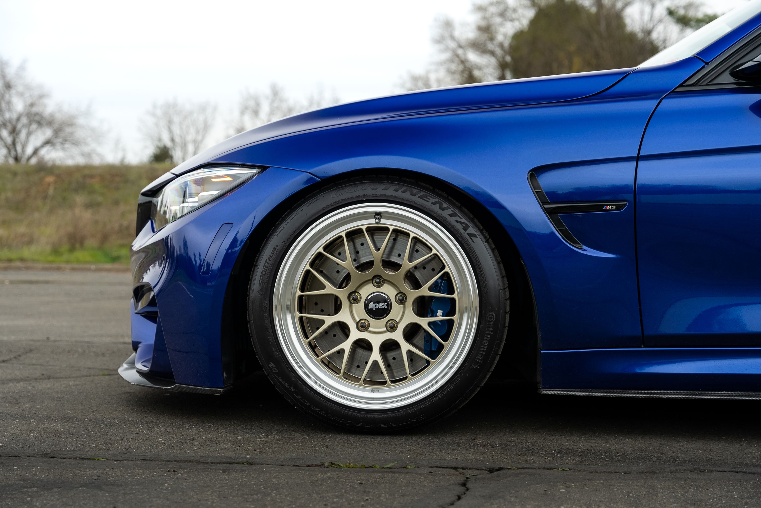 Blue BMW F80 M3 with 18" ML-10RT Apex wheels in Machined Lip Gloss Motorsport Gold