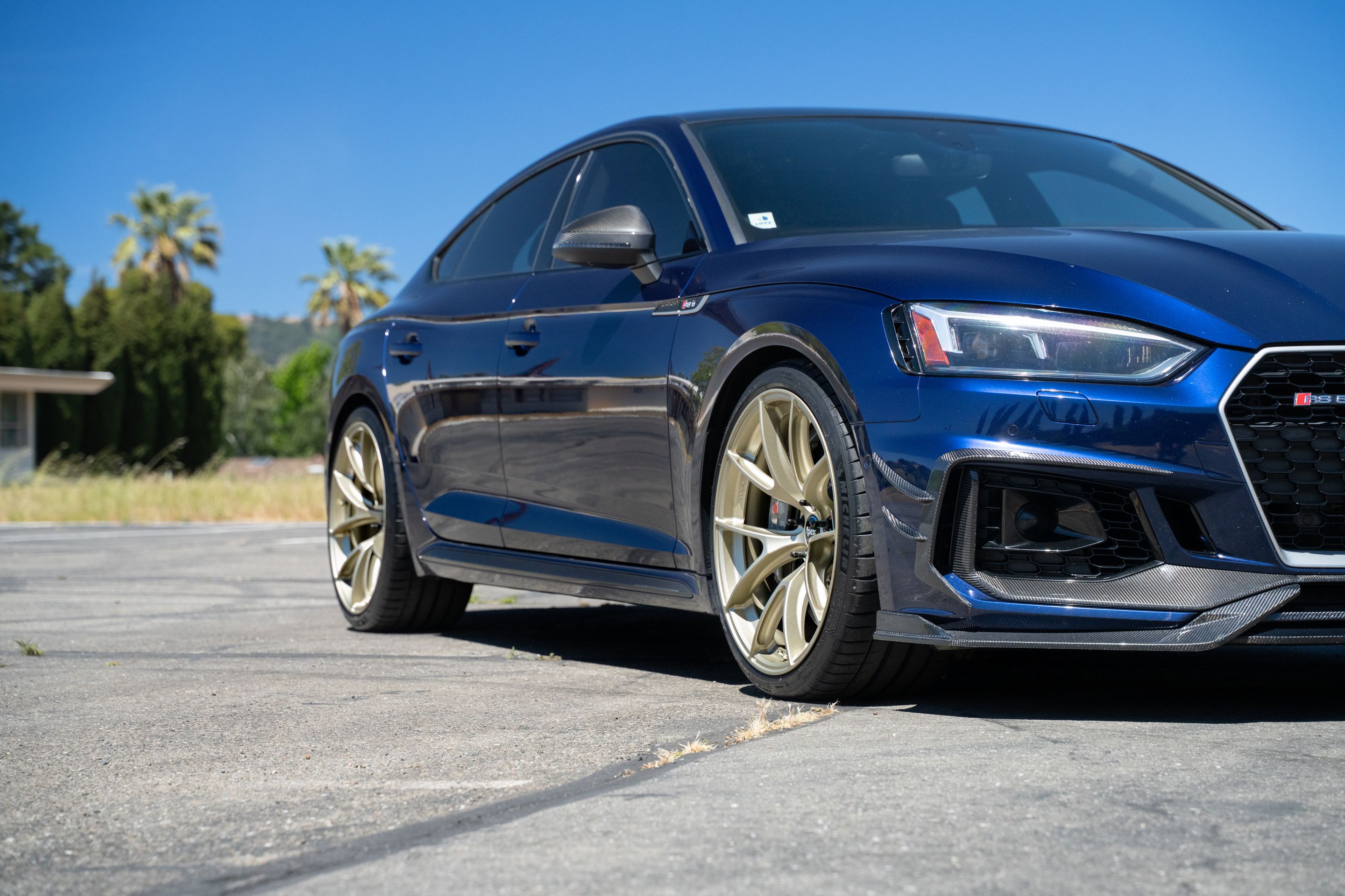 Blue Audi B9 RS 5 Sportback with 20" VS-5RS Apex wheels in Motorsport Gold