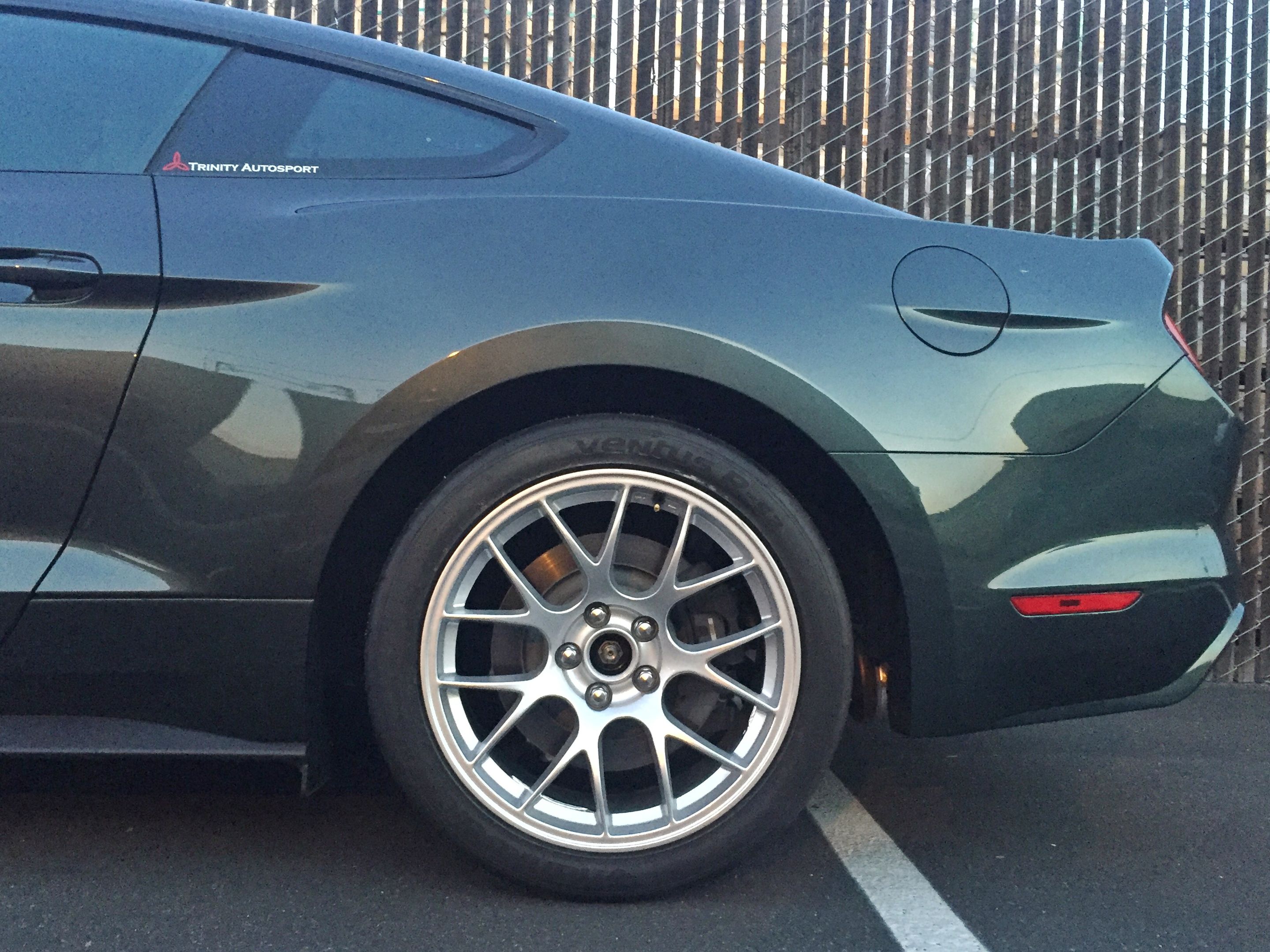 Green Ford S550 Mustang GT with 18" EC-7 Apex wheels in Race Silver