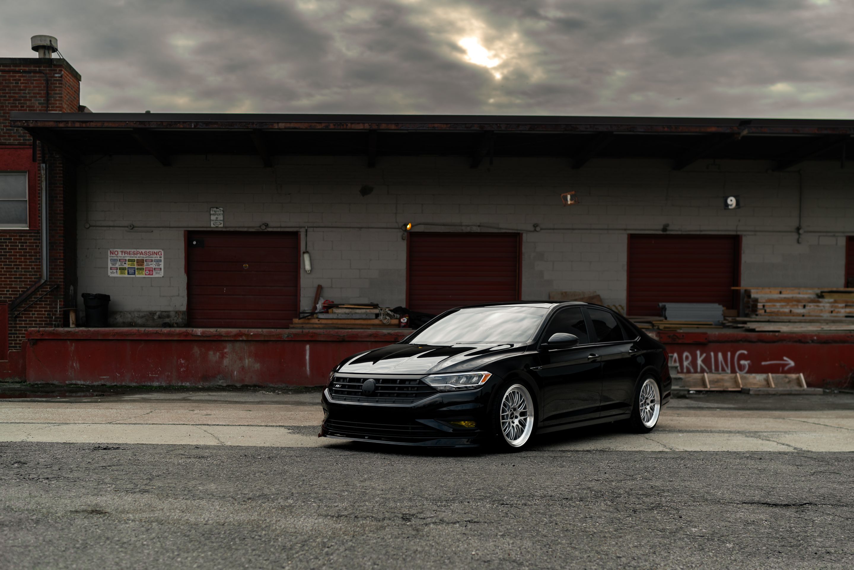 Black VW MK7 Jetta with 19" ML-10RT Apex wheels in Machined Lip Race Silver