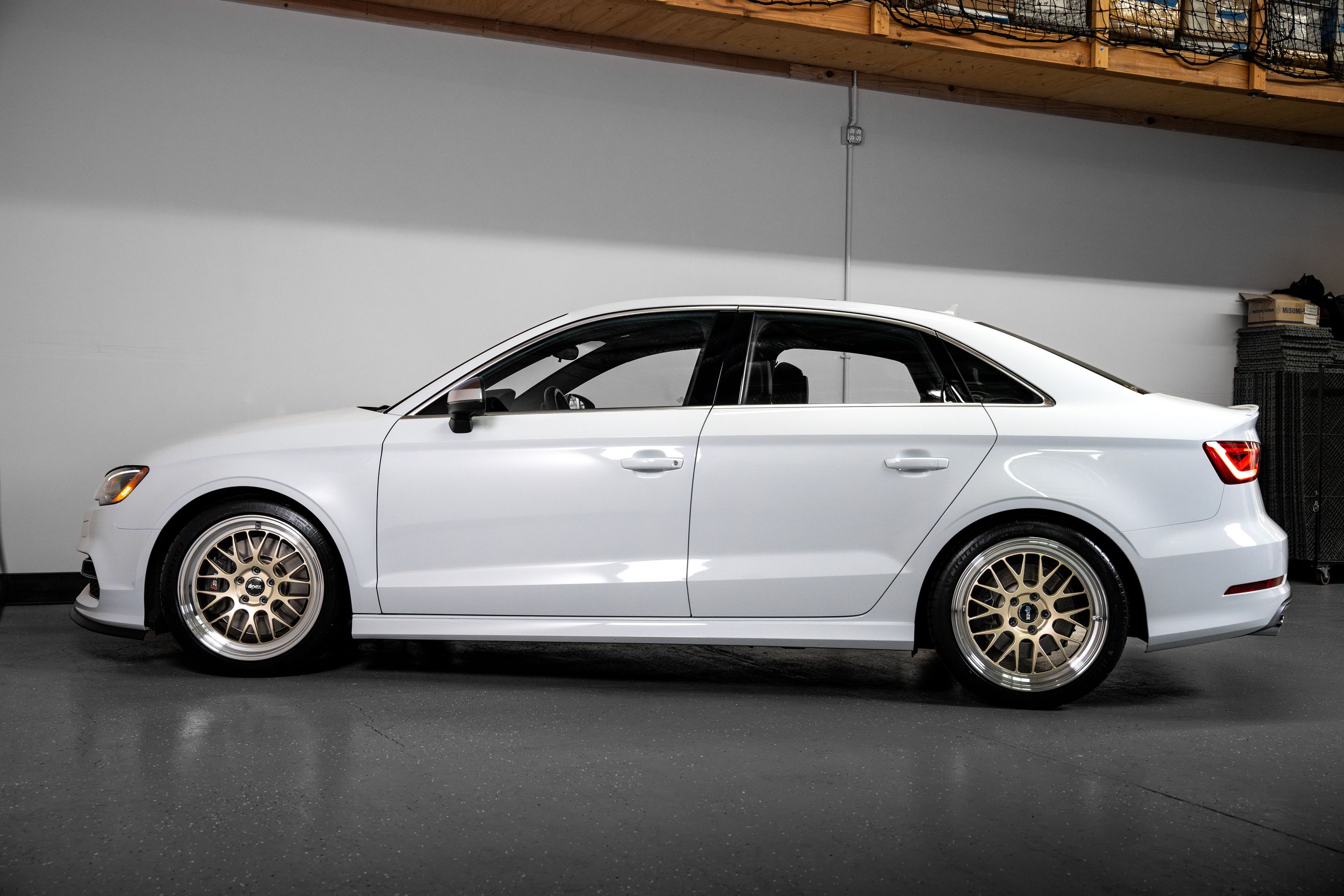 White Audi 8V S3 with 18" ML-10RT Apex wheels in Machined Lip Gloss Motorsport Gold