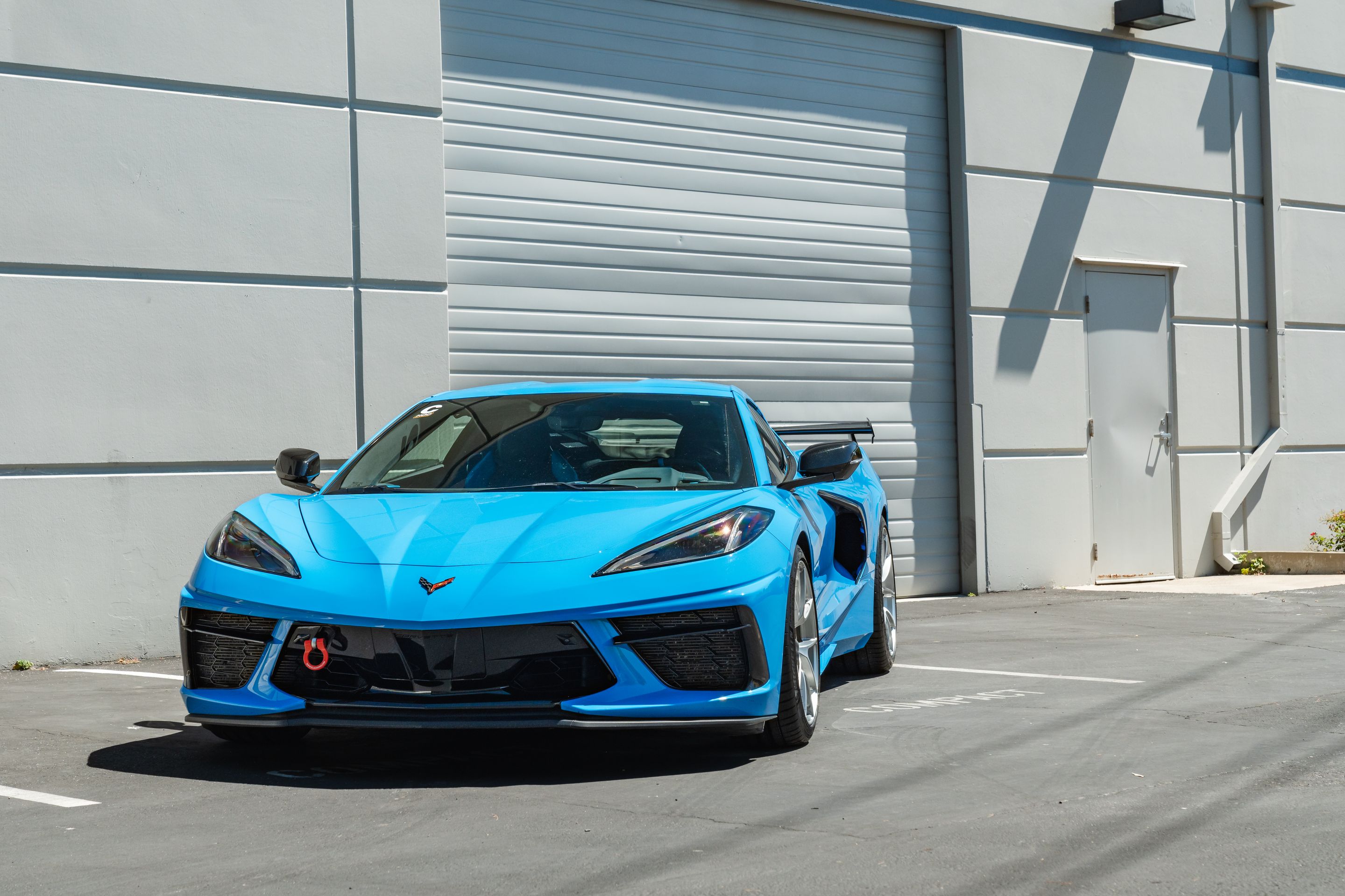 Blue Chevrolet C8 Corvette Stingray/Z51 with 19"/20" VS-5RS Apex wheels in Brushed Clear