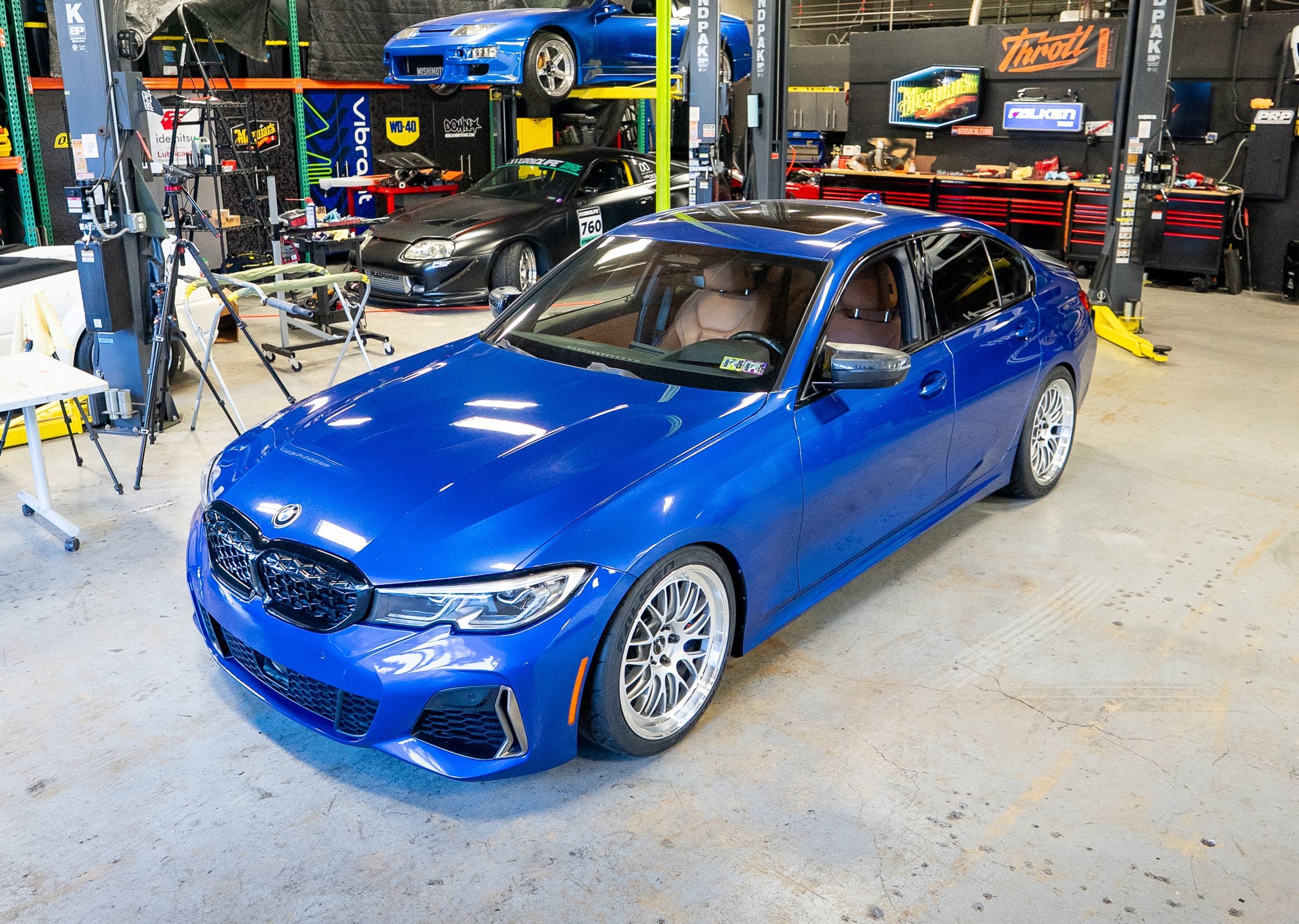 Blue BMW G20 Sedan 3 Series with 19" ML-10RT Apex wheels in Machined Lip Race Silver
