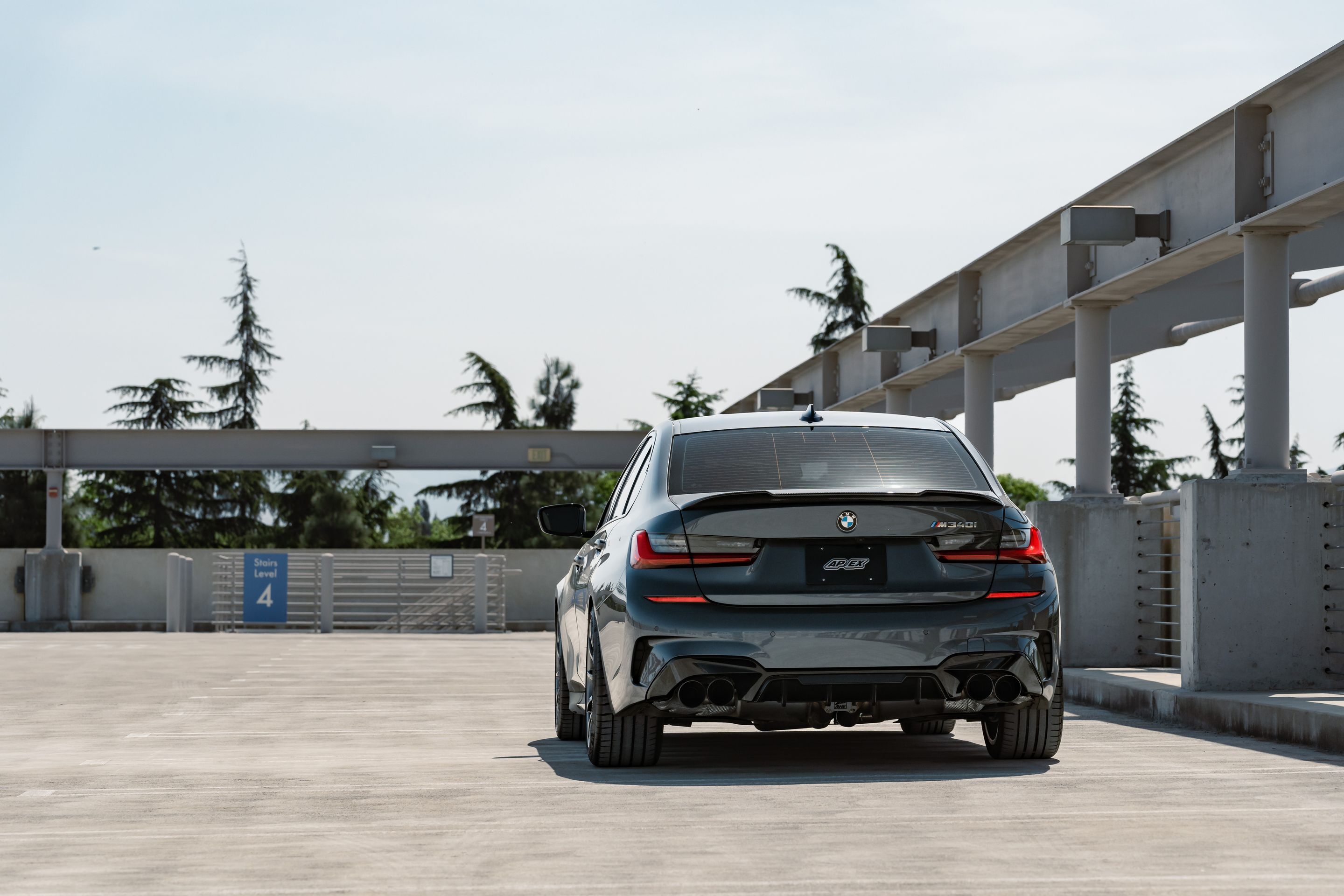 Grey BMW G20 Sedan 3 Series with 19" SM-10 Apex wheels in Anthracite