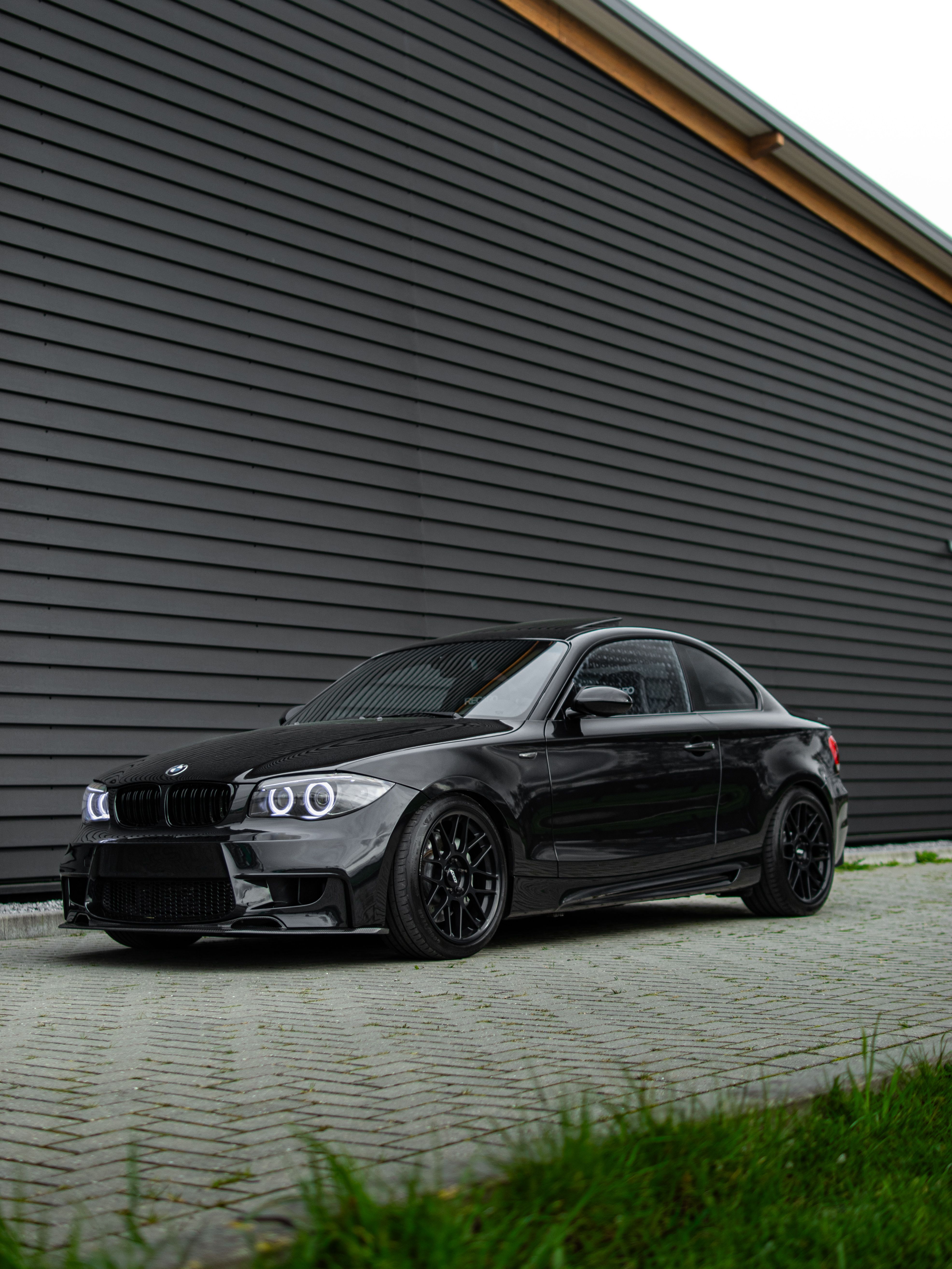 Black BMW E82 Coupe 1 Series with 18" ARC-8 Apex wheels in Satin Black