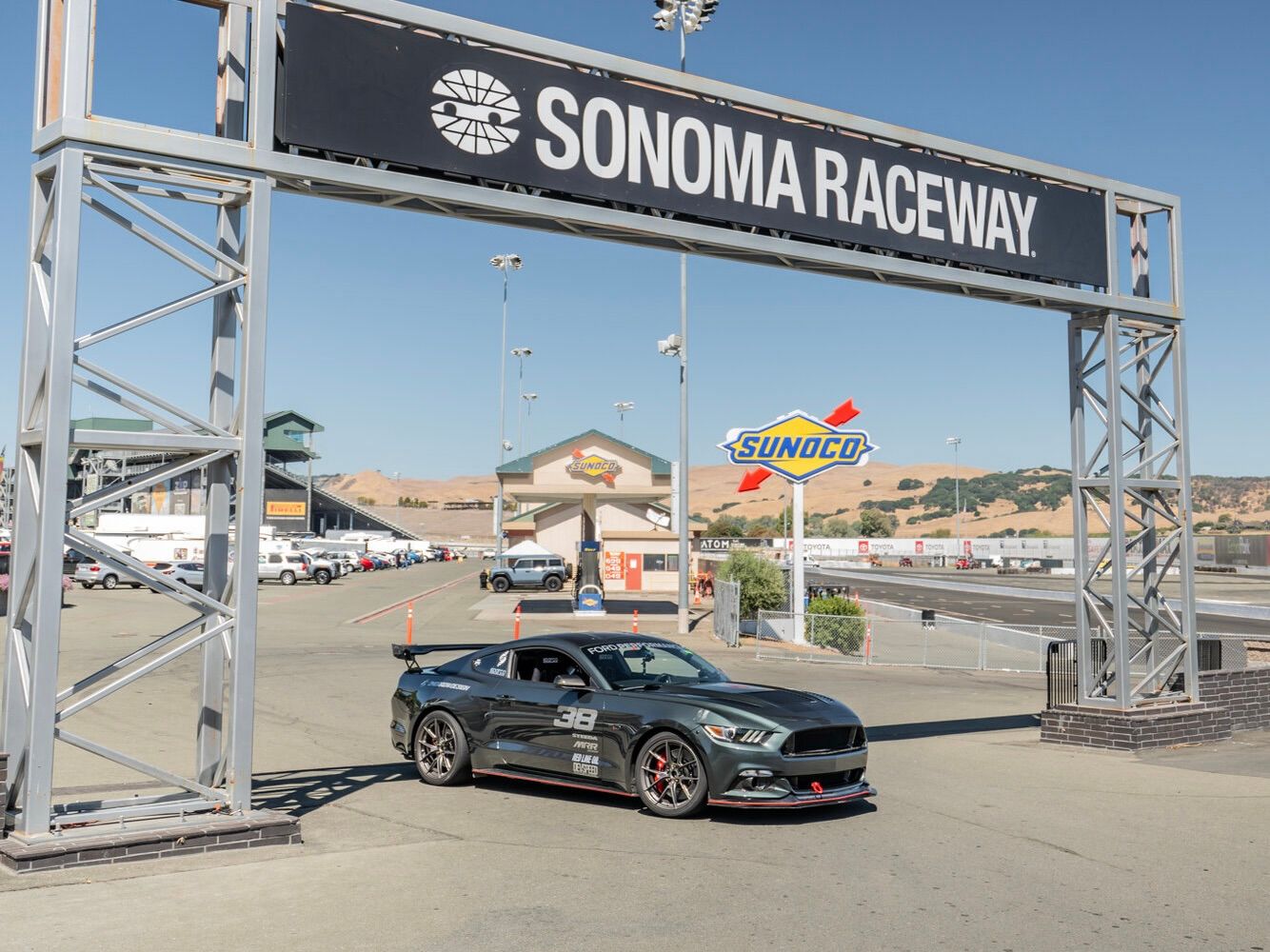 Green Ford S550 Mustang GT with 19" VS-5RS Apex wheels in Anthracite