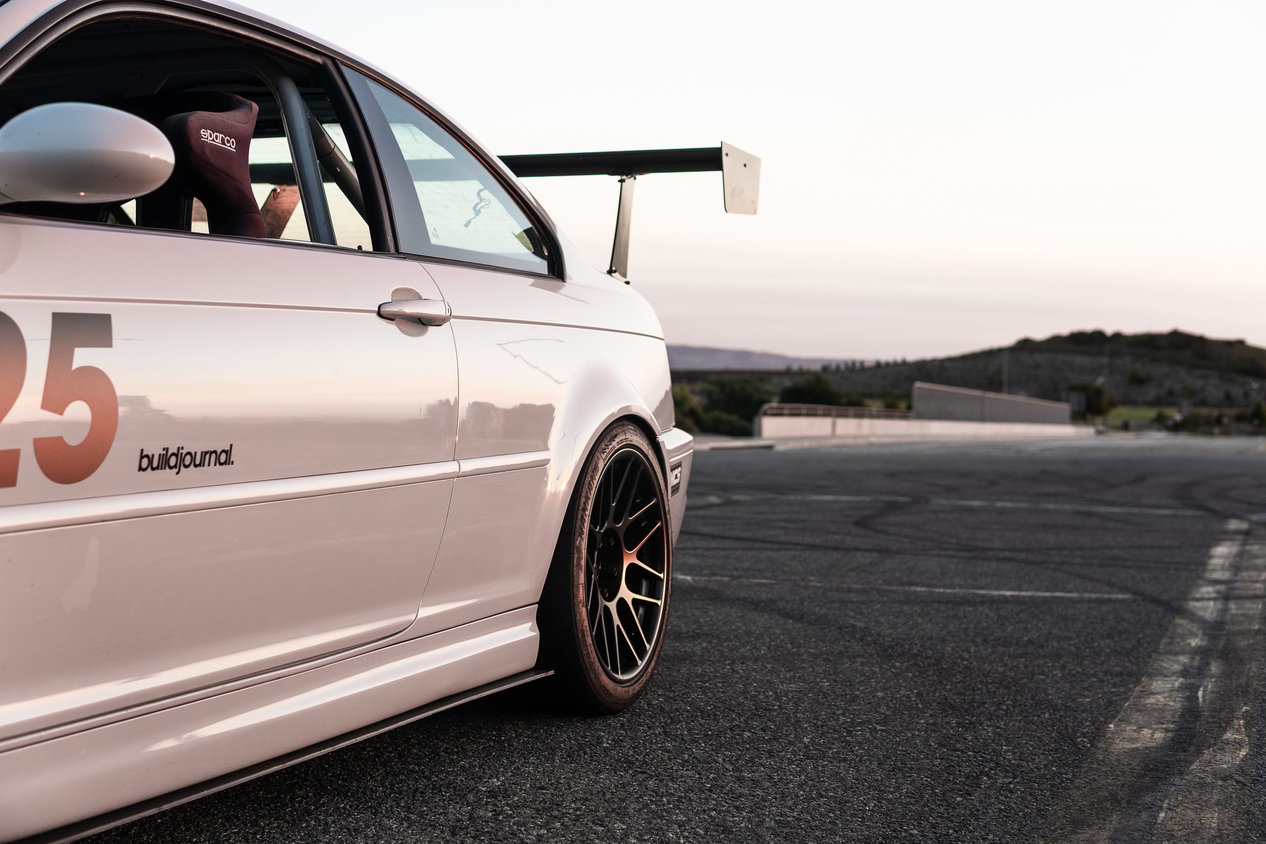 White BMW E46 M3 with 18" ARC-8R Apex wheels in Satin Black