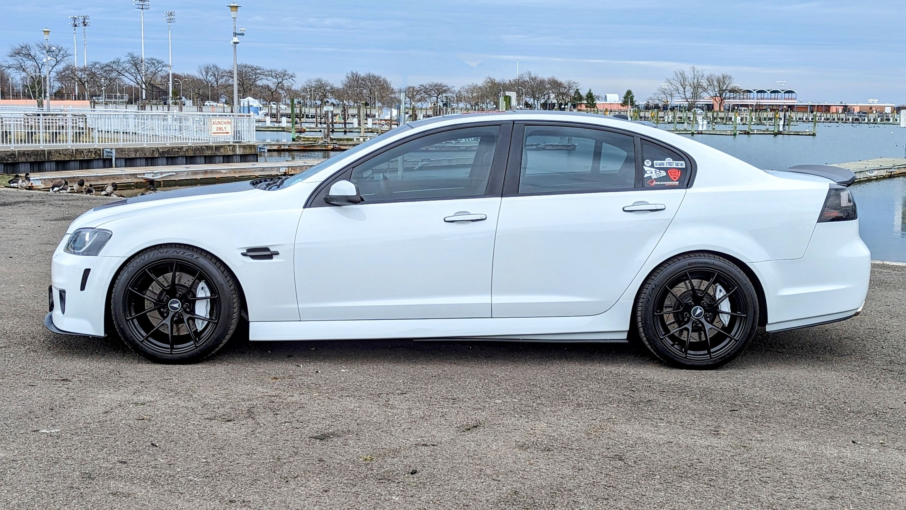White Pontiac G8 GT with 19" VS-5RS Apex wheels in Satin Black