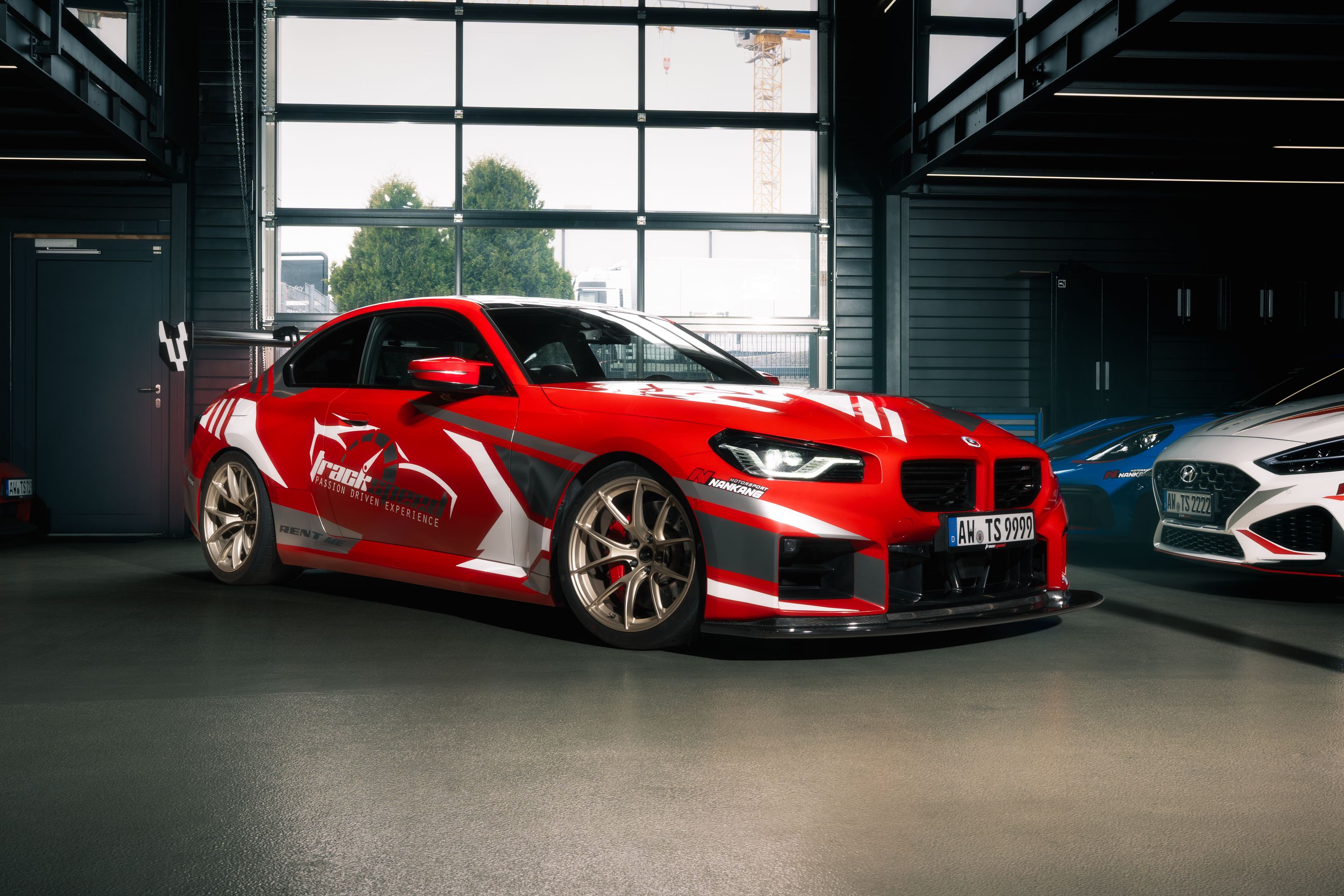 Red BMW G87 M2 with 19" VS-5RS Apex wheels in Motorsport Gold