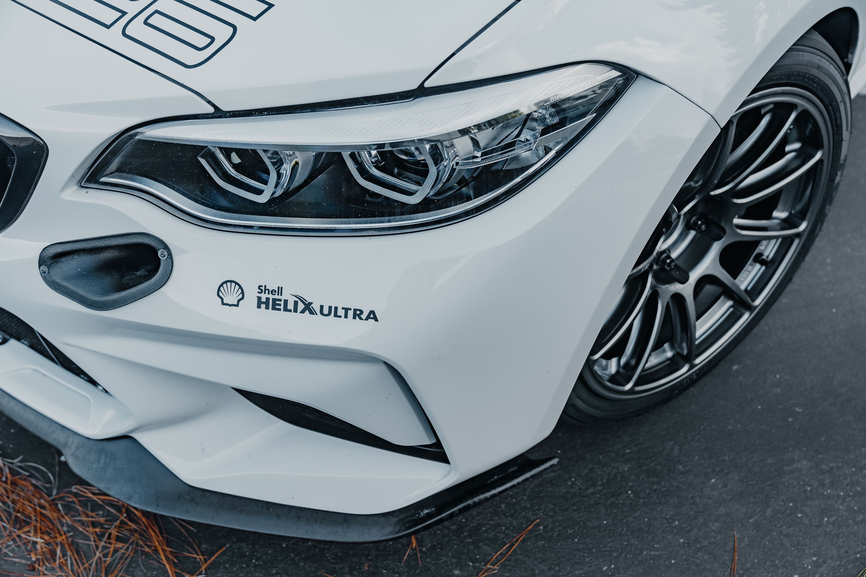 White BMW F87 M2 with 18" SM-10RE Apex wheels in Anthracite
