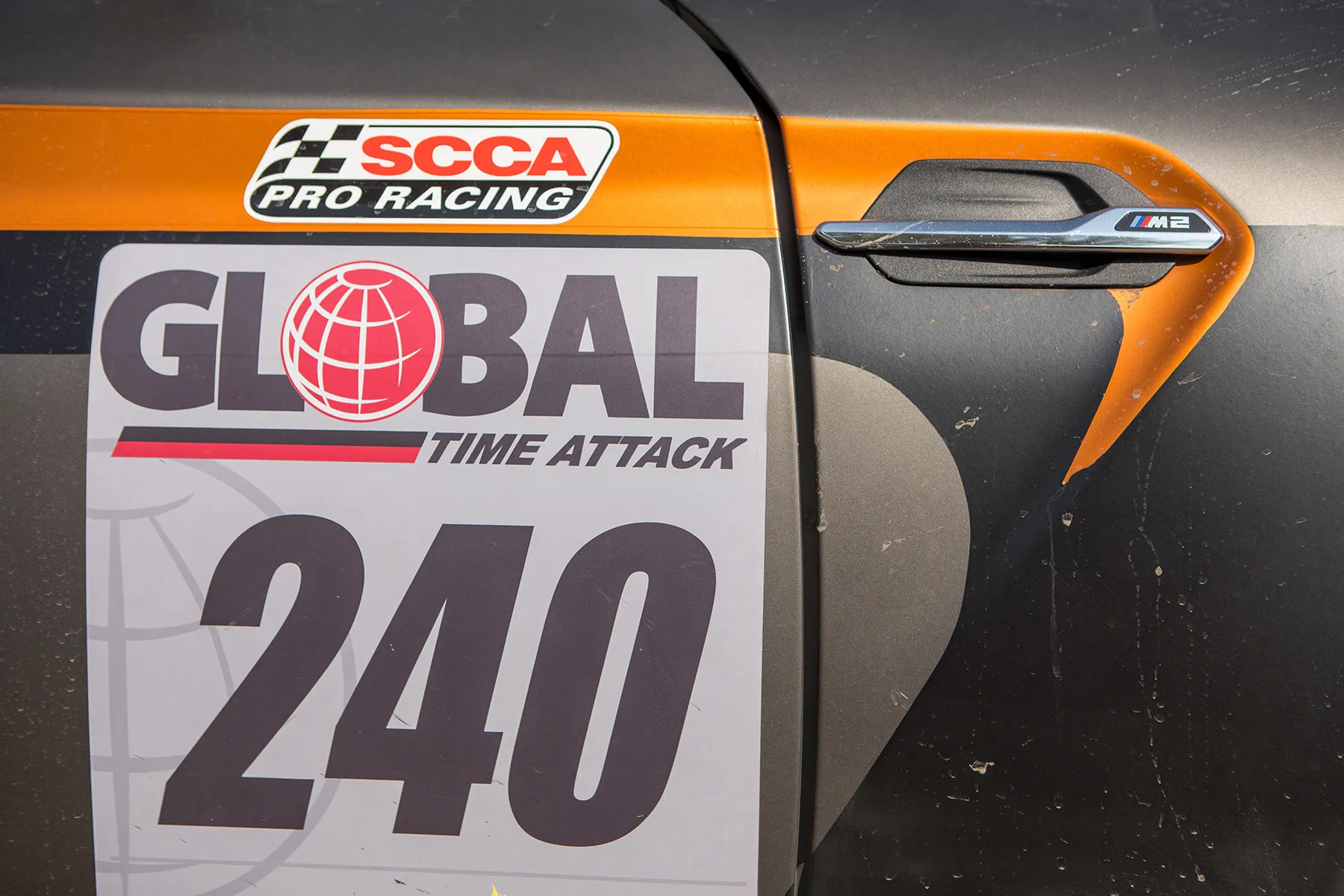 Multicolor BMW F87 M2 with 18" ARC-8R Apex wheels in Satin Black