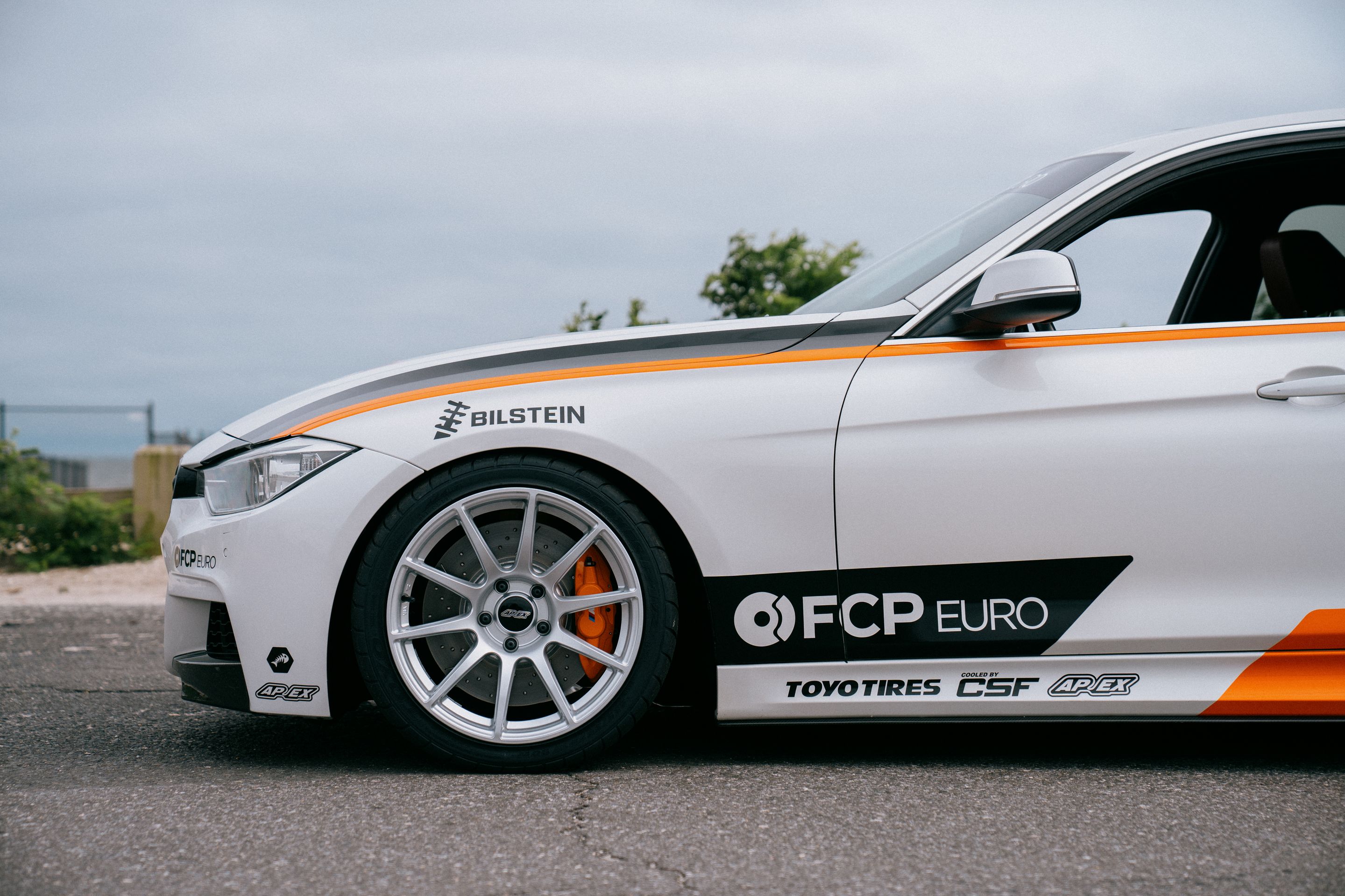 White BMW F30 Sedan 3 Series with 18" SM-10 Apex wheels in Race Silver