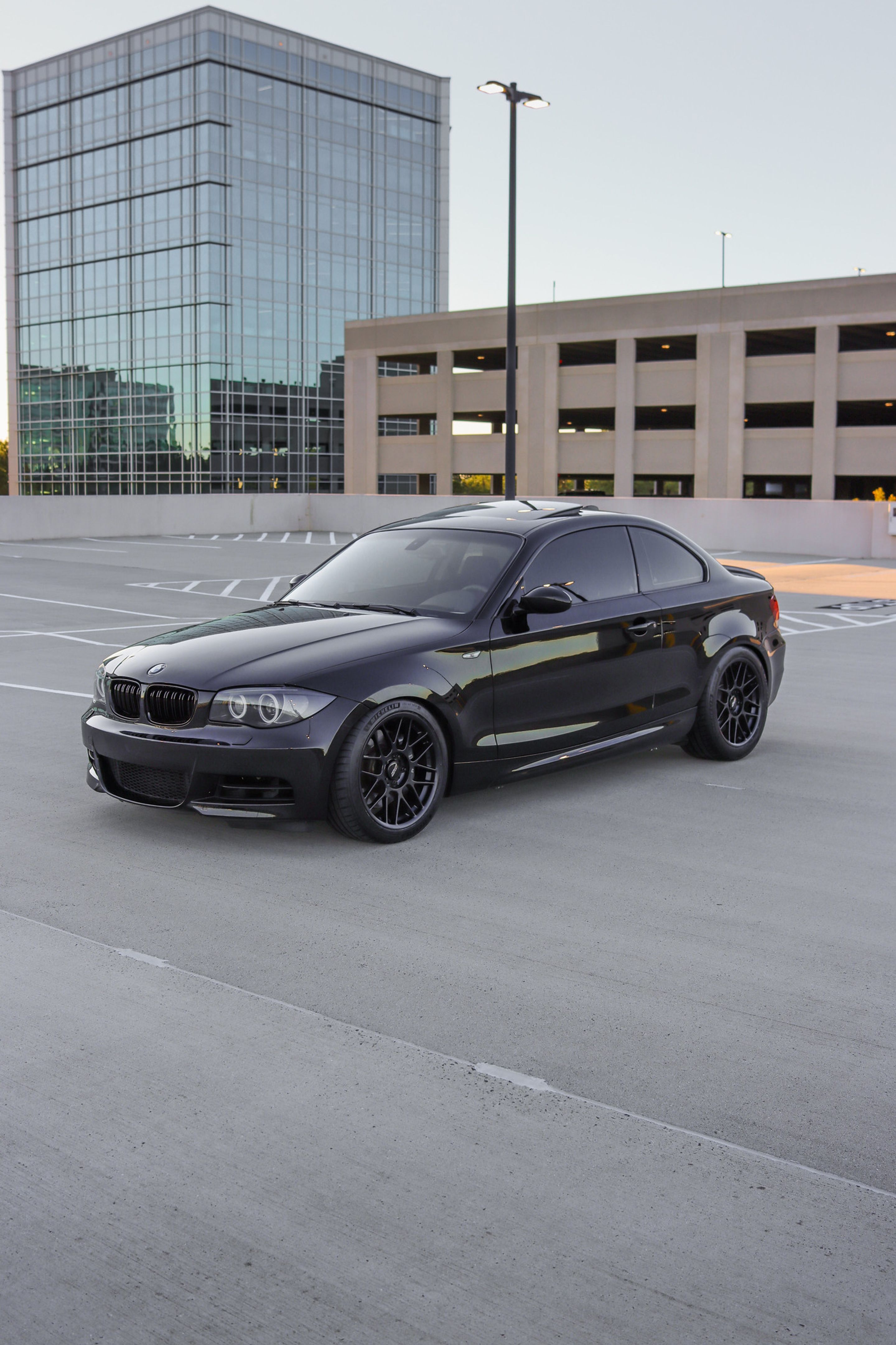 Black BMW E82 Coupe 1 Series with 18" ARC-8 Apex wheels in Satin Black