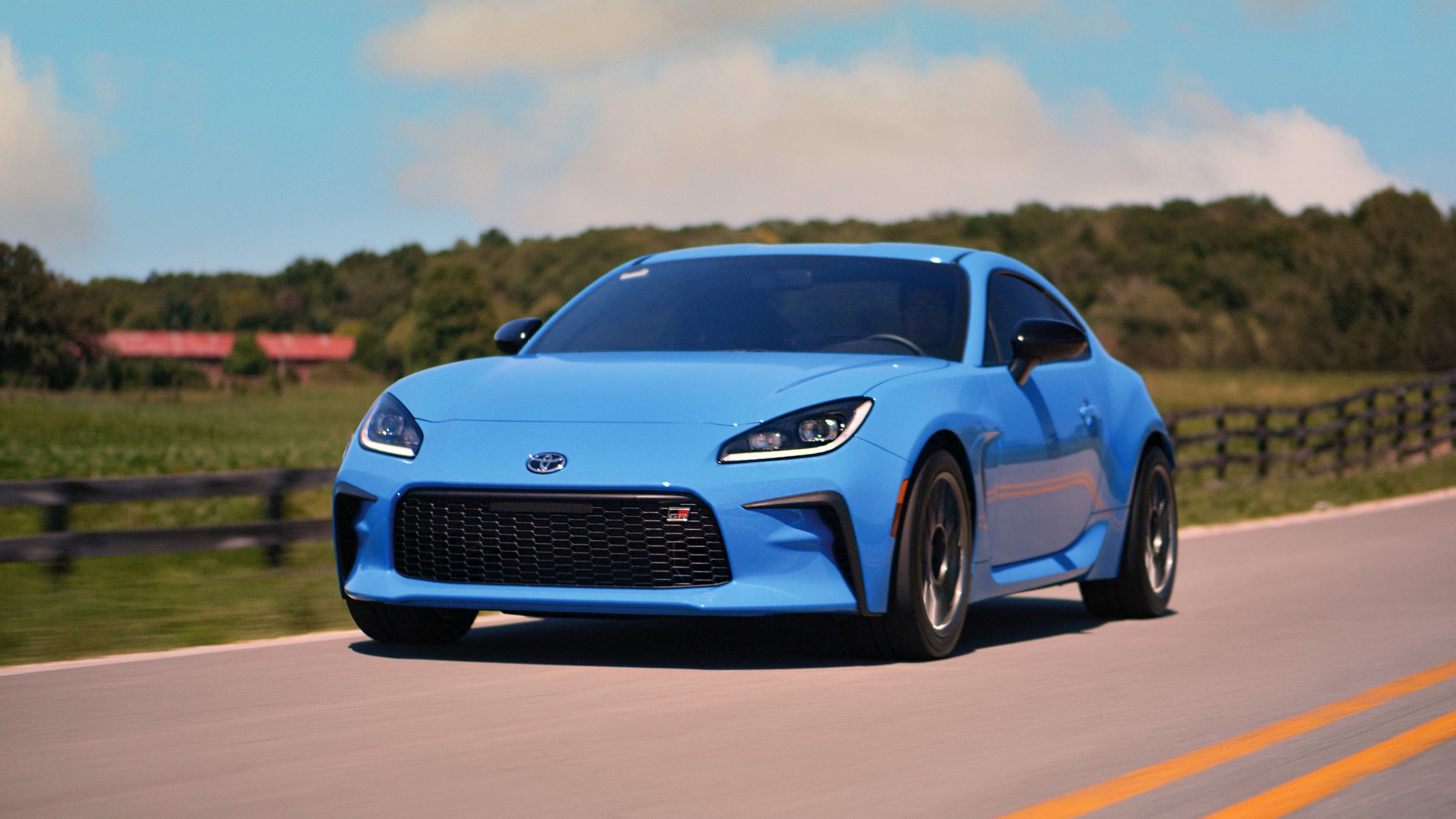 Blue Toyota GR86 with 17" ARC-8 Apex wheels in Anthracite