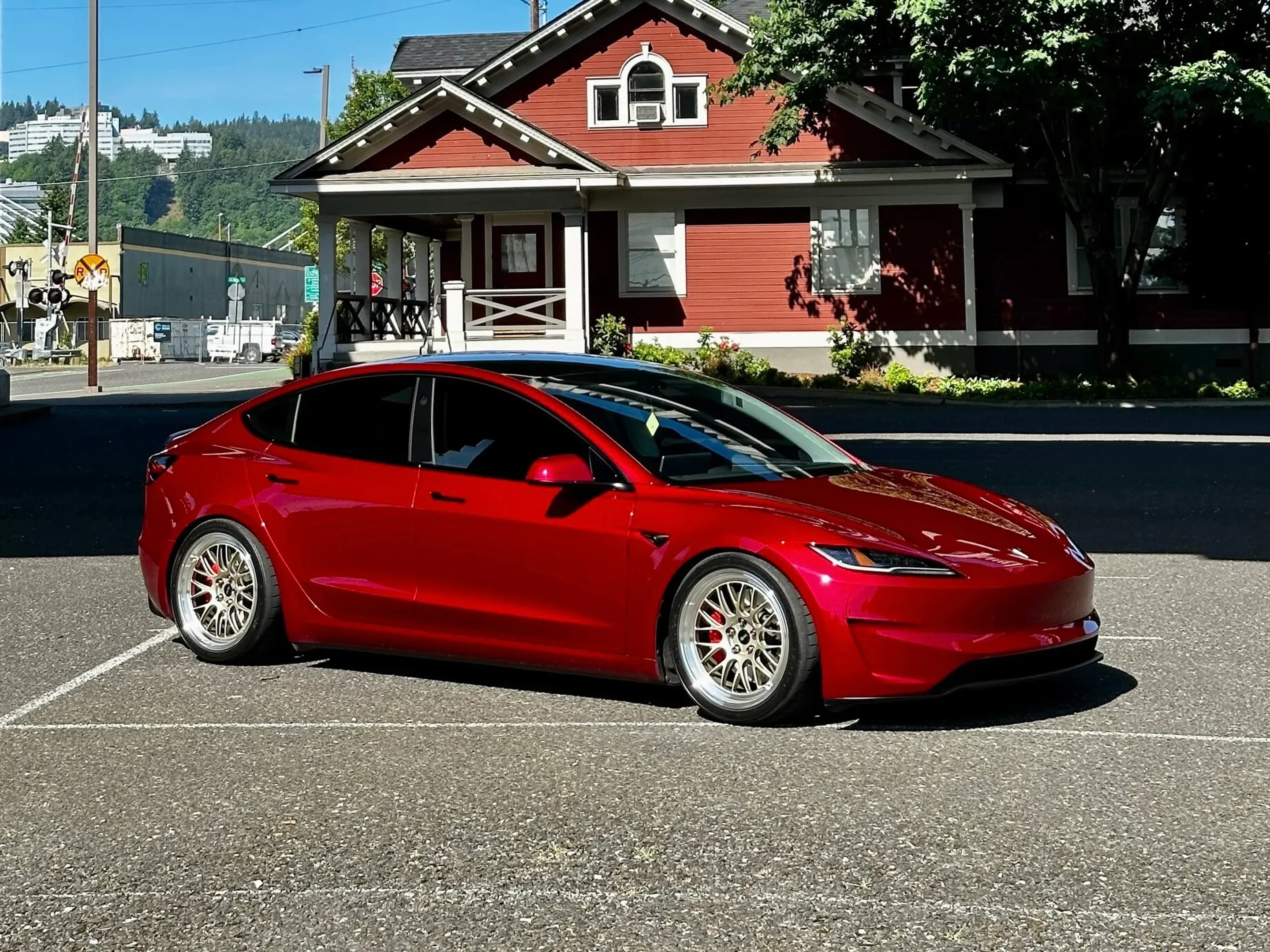 Red Tesla Model 3 with 19" ML-10RT Apex wheels in Machined Lip Gloss Motorsport Gold