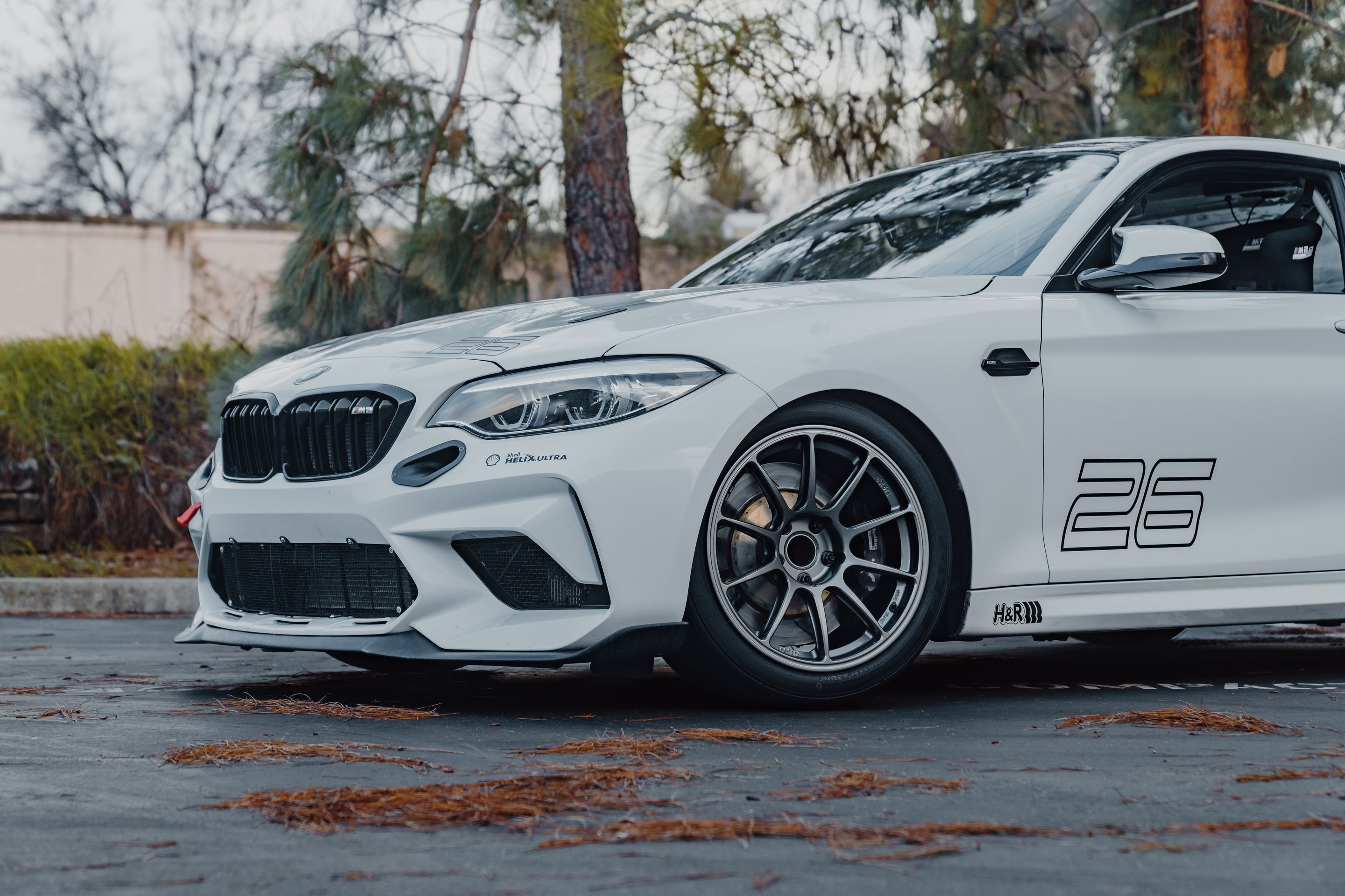 White BMW F87 M2 with 18" SM-10RE Apex wheels in Anthracite