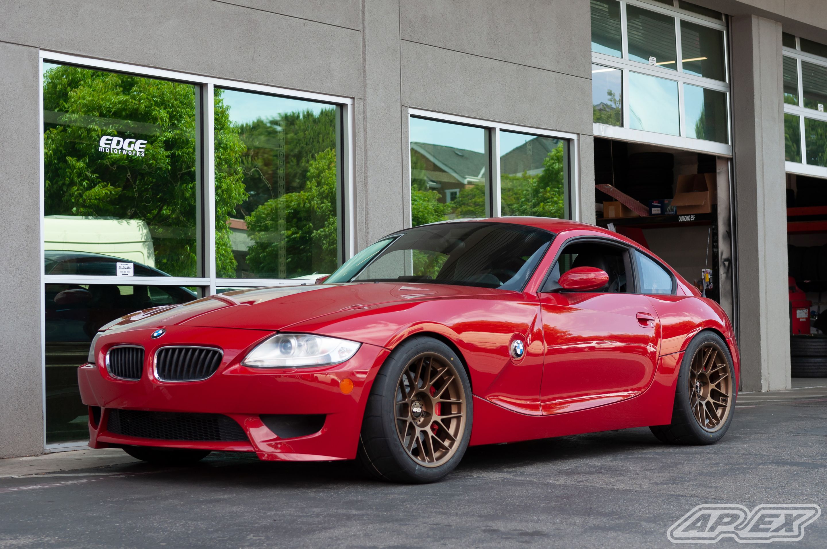 Red BMW E86 Coupe Z4 M with 18" ARC-8 Apex wheels in Satin Bronze
