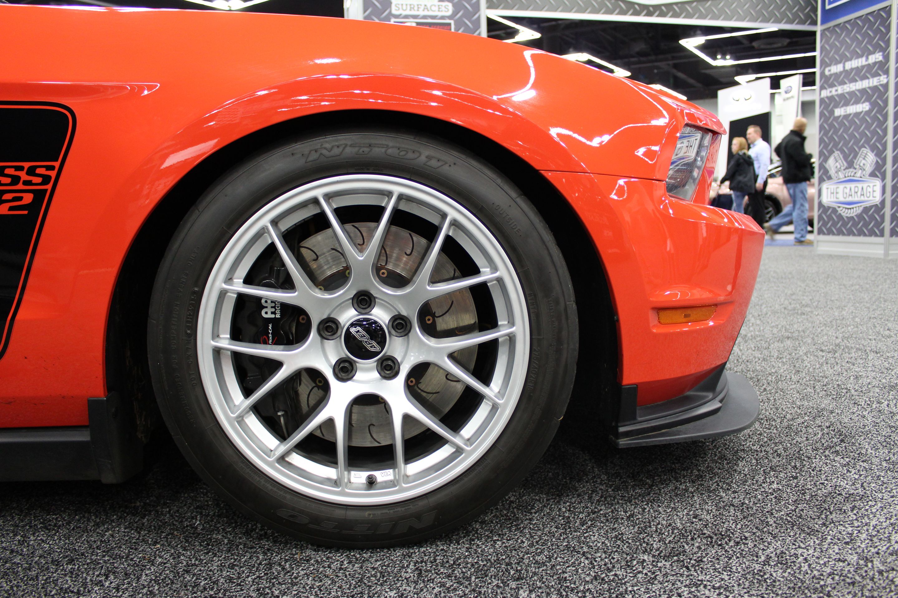 Orange Ford S197 Mustang Boss 302 with 18" EC-7 Apex wheels in Race Silver