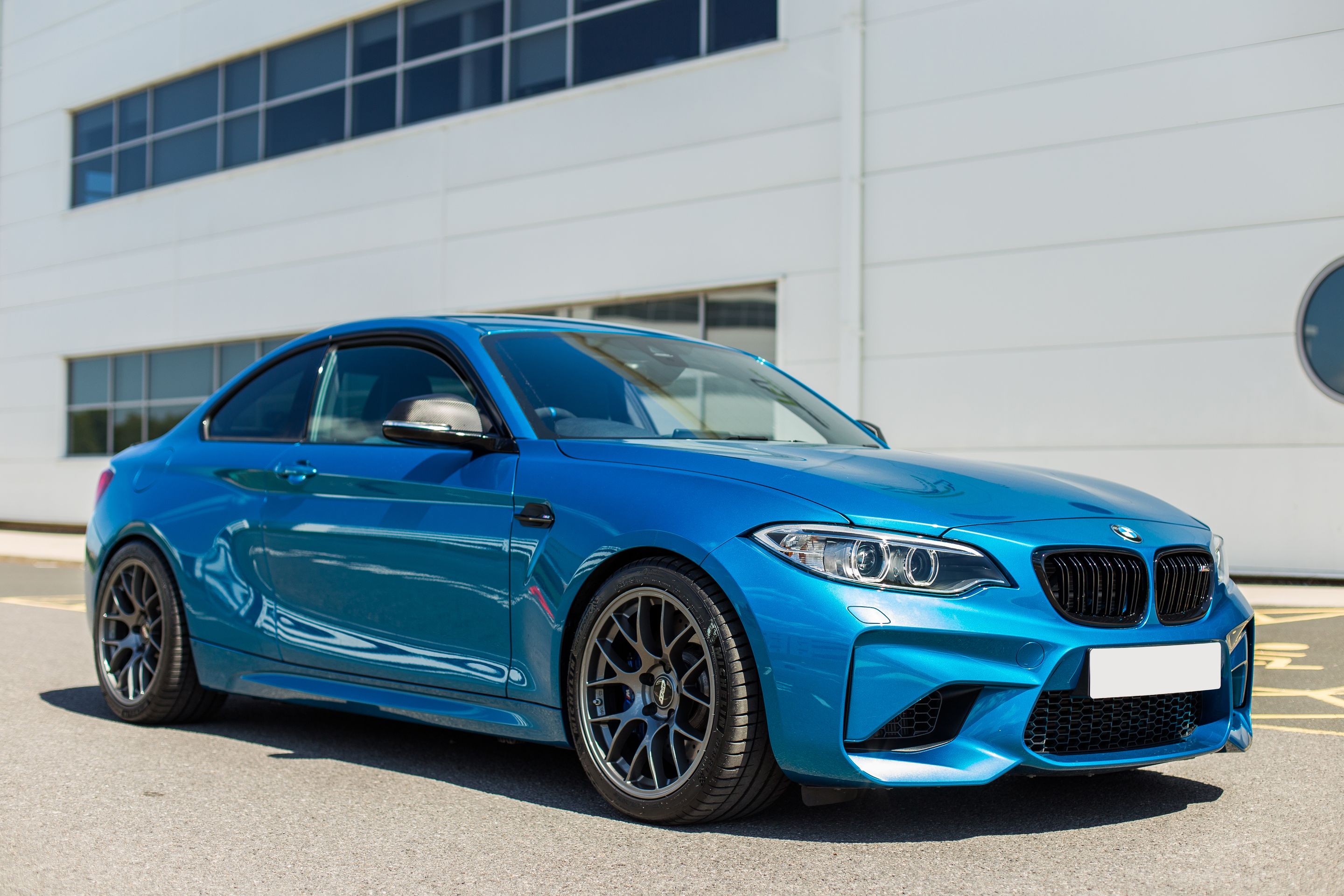 Blue BMW F87 M2 with 18" EC-7 Apex wheels in Anthracite