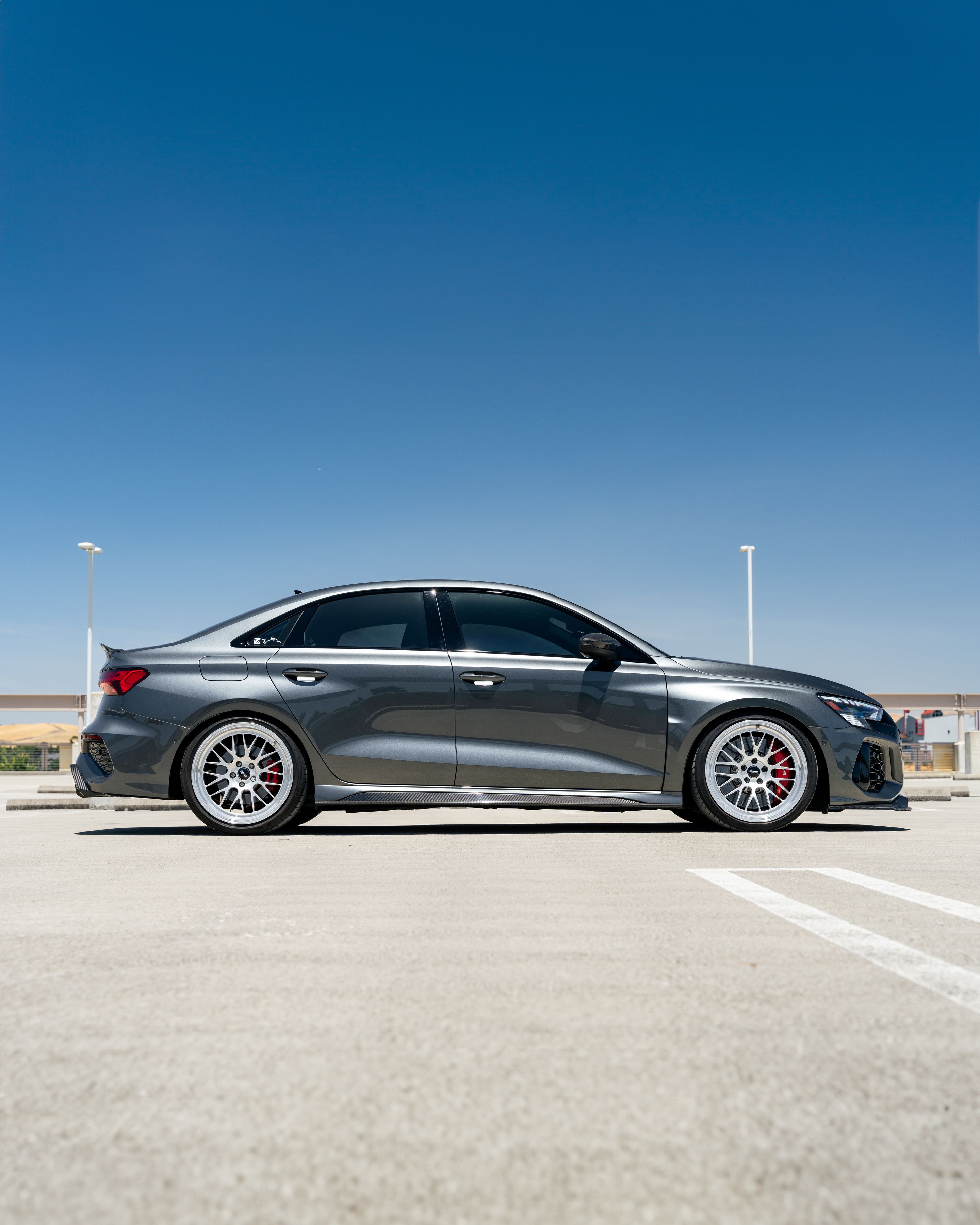 Grey Audi 8Y RS 3 with 19" ML-10RT Apex wheels in Machined Lip Race Silver