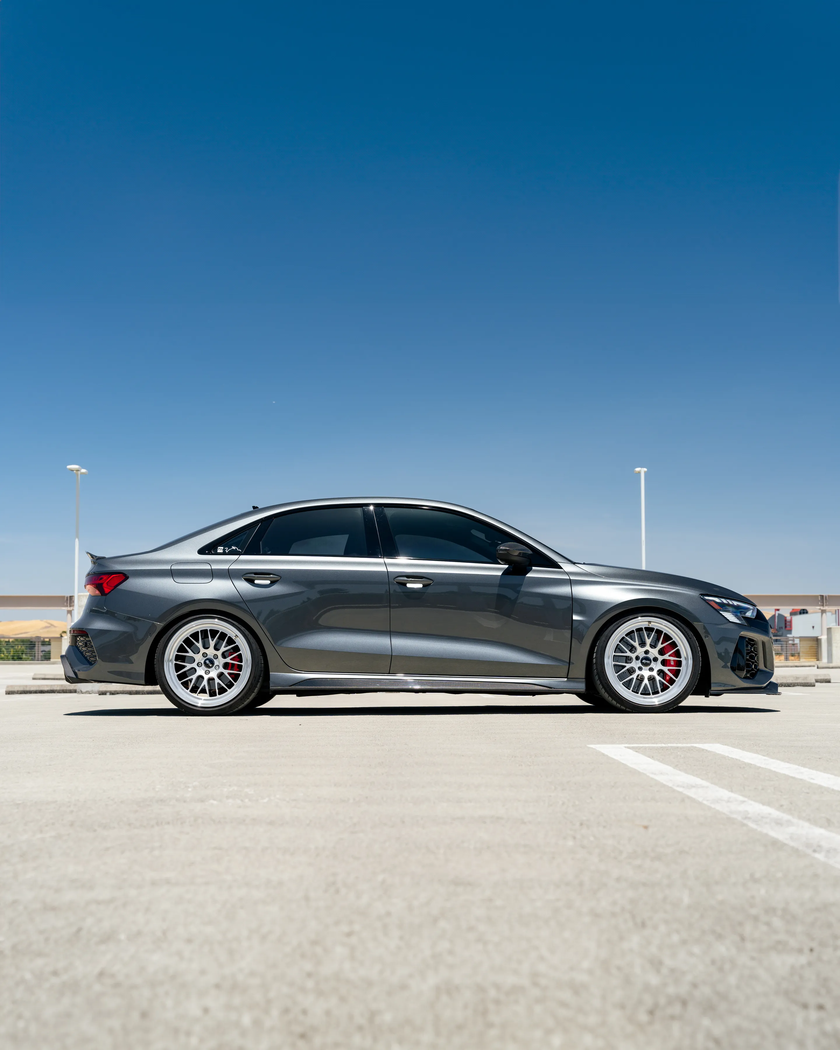 Grey Audi 8Y RS 3 with 19" ML-10RT Apex wheels in Machined Lip Race Silver