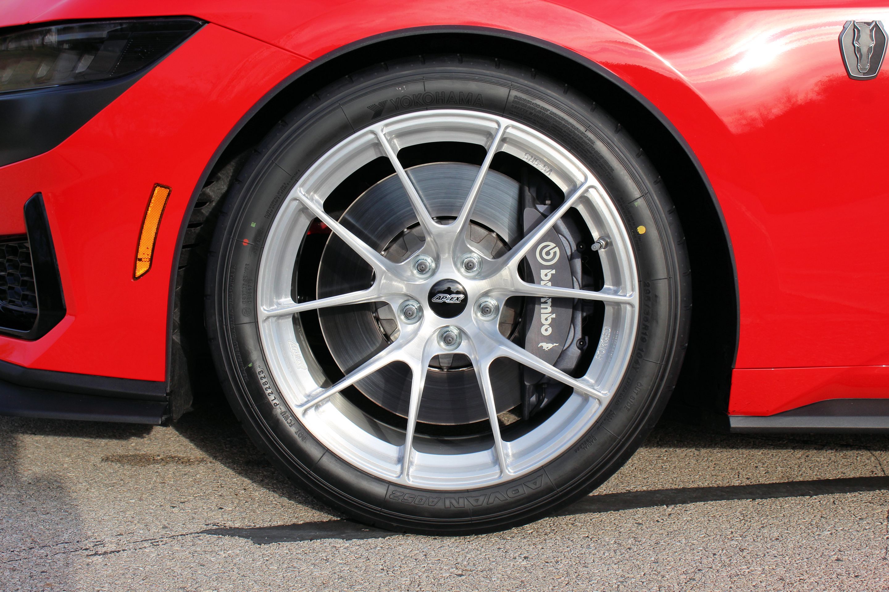 Red Ford S650 Mustang Dark Horse with 19" VS-5RS Apex wheels in Brushed Clear