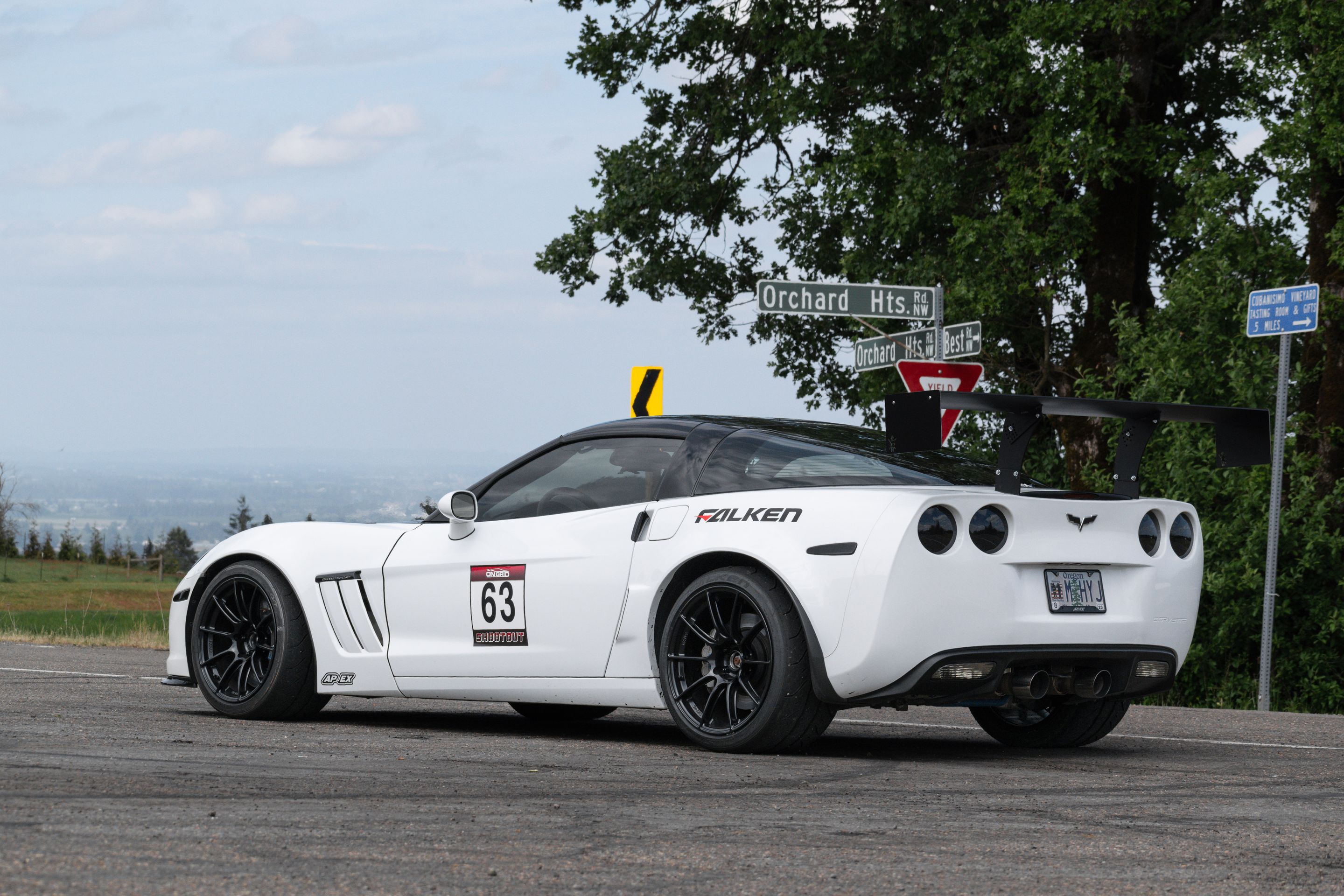 White Chevrolet C6 Corvette Grand Sport with 18"/19" SM-10RS Apex wheels in Satin Black